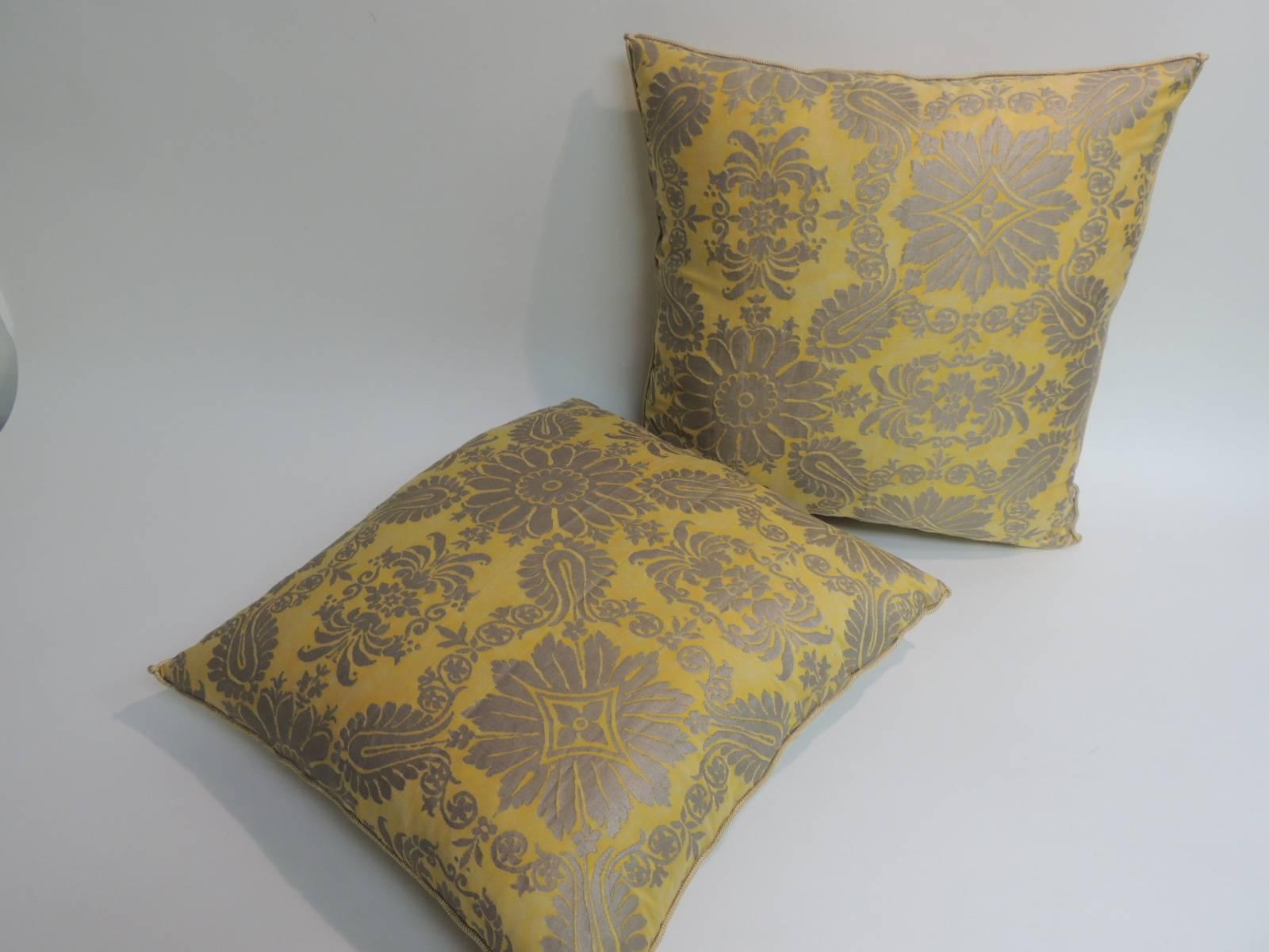 Pair of vintage floral Fortuny decorative pillows imperio pattern yellow and gold with gold silk backings and decorative rope trim all around.
Decorative pillow handcrafted and designed in the USA. Closure by stitch (no zipper closure) with