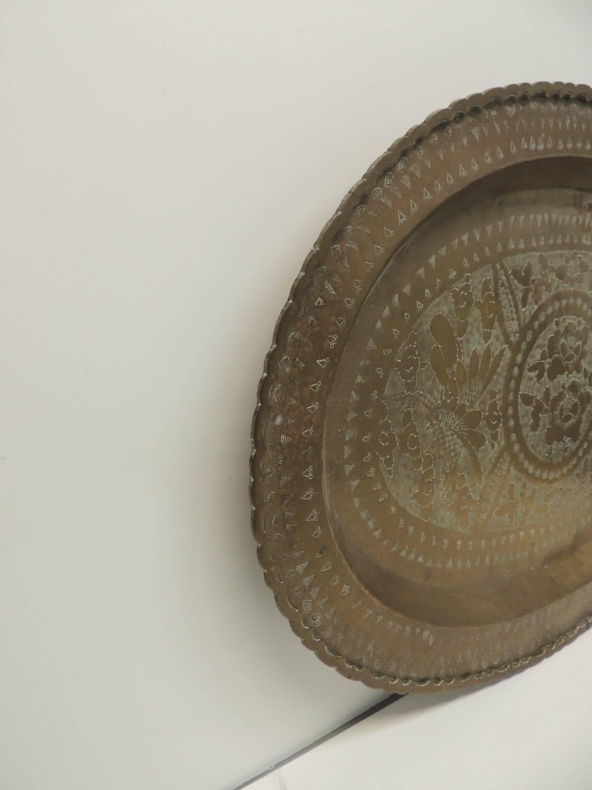 Antique Textiles Galleries:
Vintage oval Persian brass serving tray
Vintage hand-hammered brass depicting flowers and vines oval Persian serving tray.
Hanging hook in the back.
Size: 16.5 x 24 x 1.5.
 