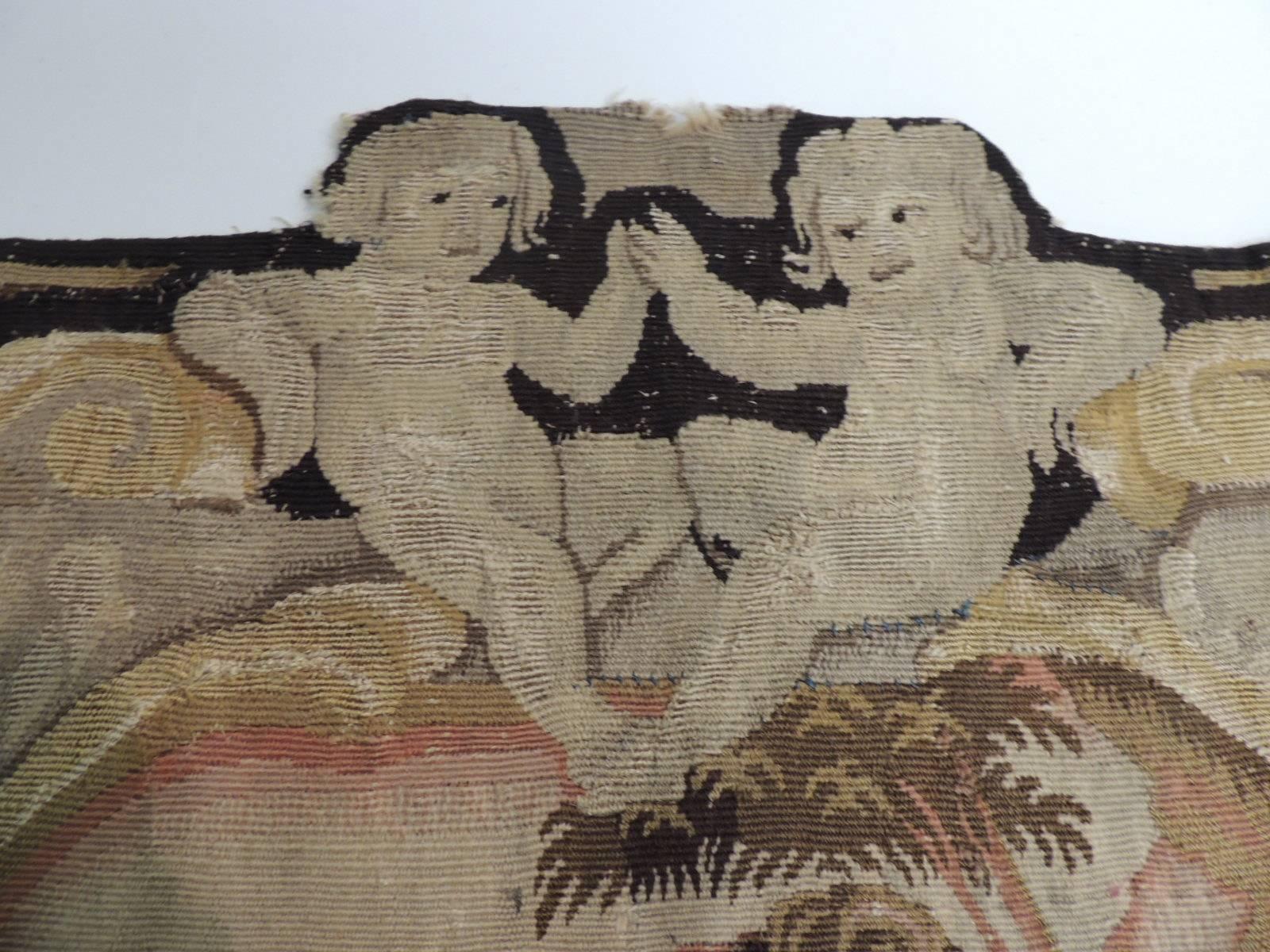 18th century large Aubusson tapestry panel. The motif depicts cherubs, rams and a young boy playing in the forest. 
Large Aubusson tapestry textile with a motif depicting cherubs, rams and a young boy playing in the fores. Antique Aubusson textile