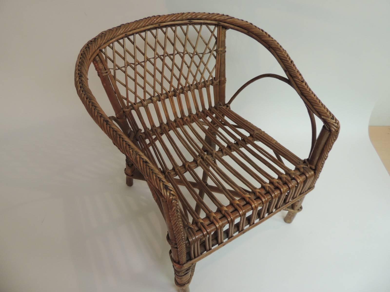 Vintage rattan and bamboo child’s armchair
Vintage rattan and bamboo child’s armchair with an intricate design handcrafted with basket weave back and arms.
Size: 16 W x 16 D x 17 BH x 9 SH x 11” D.

 