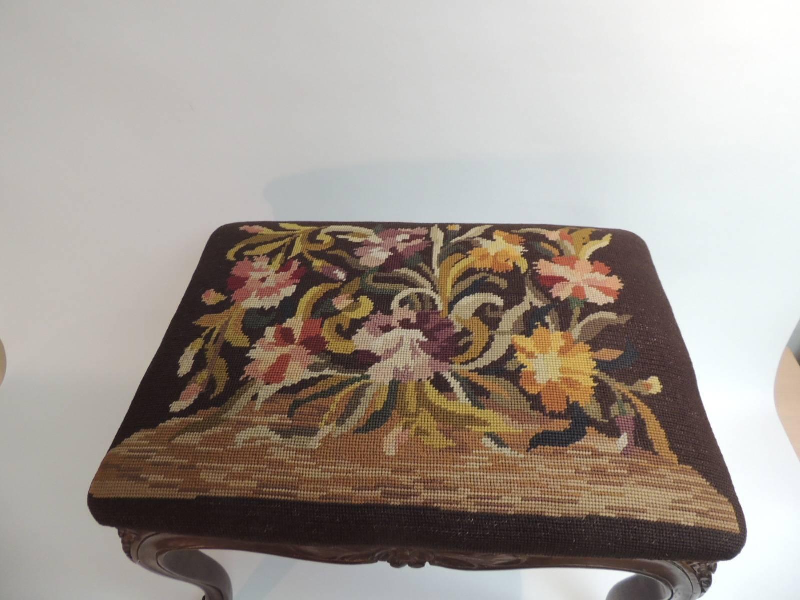 tapestry covered ottoman