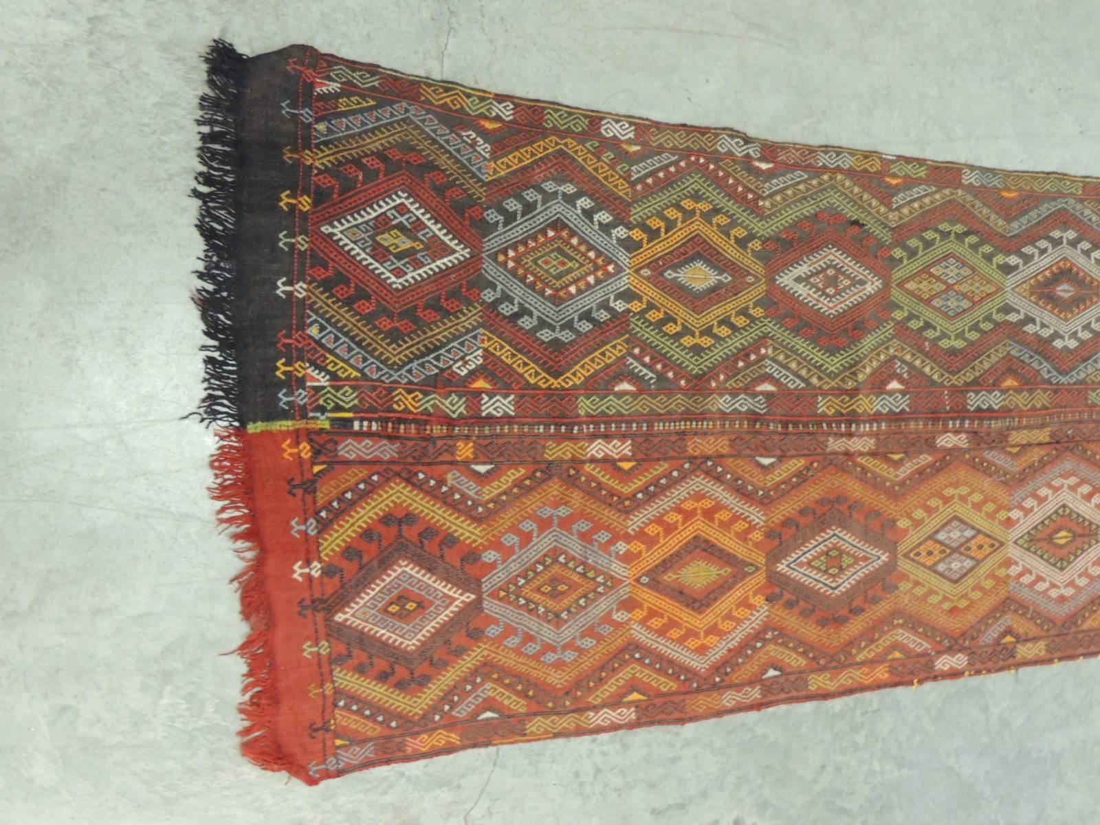 19th century Turkish handwoven wall hanging textile with fringes. Large colorful textile with tribal pattern.
Could be use as a table cloth, floor runner or wall hanging. Very thick pile great for upholstery too.
Size: 64 W x 110 L.
 