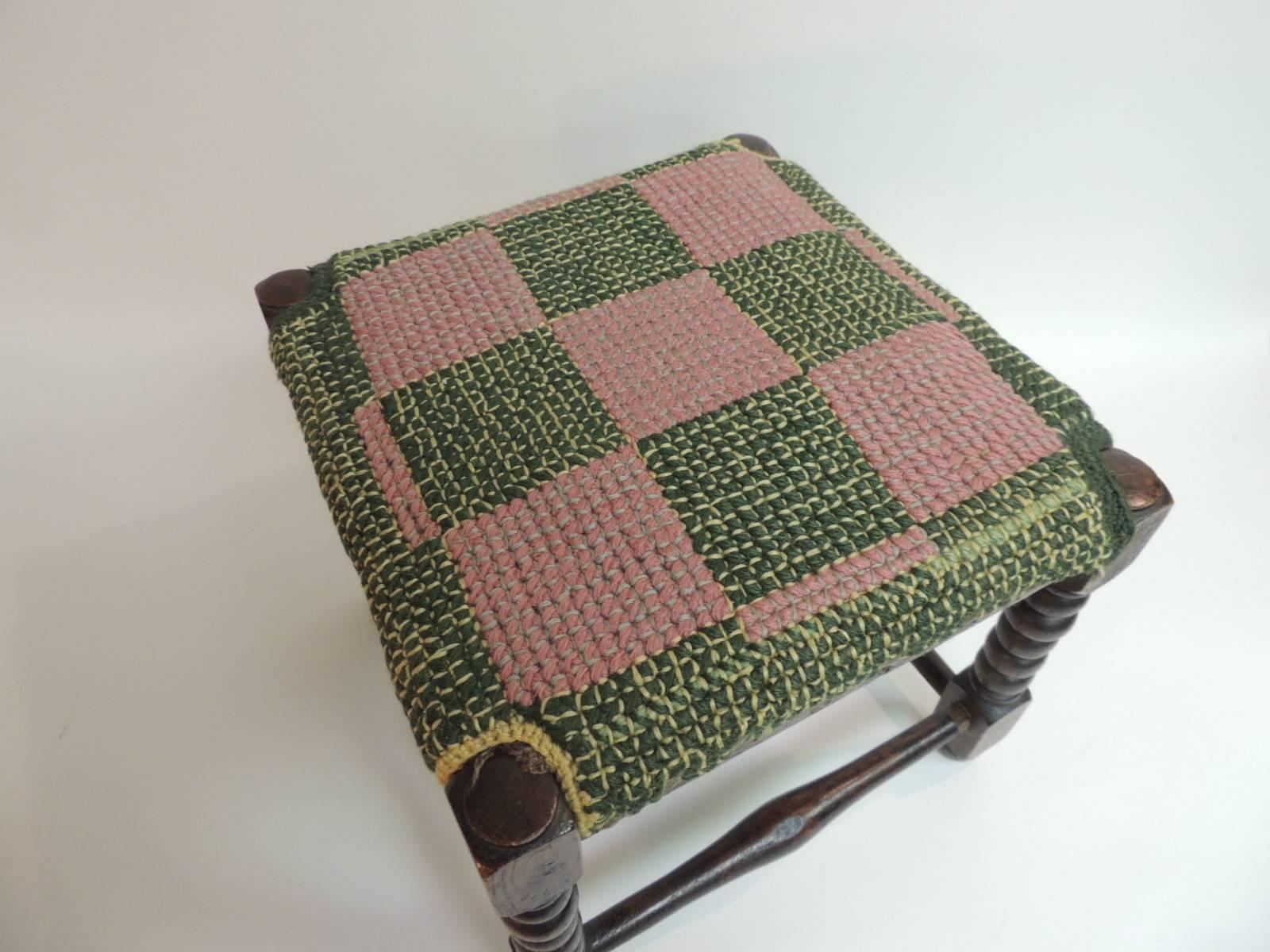 Antique Square William and Mary Style Turned Wood Legs Stool
Antique Square William and Mary Style Turned Wood Legs Stool. Four legs small ottoman upholstered in a rag rug green and pink top.
Size: 13 x 13 x 12.5 H
