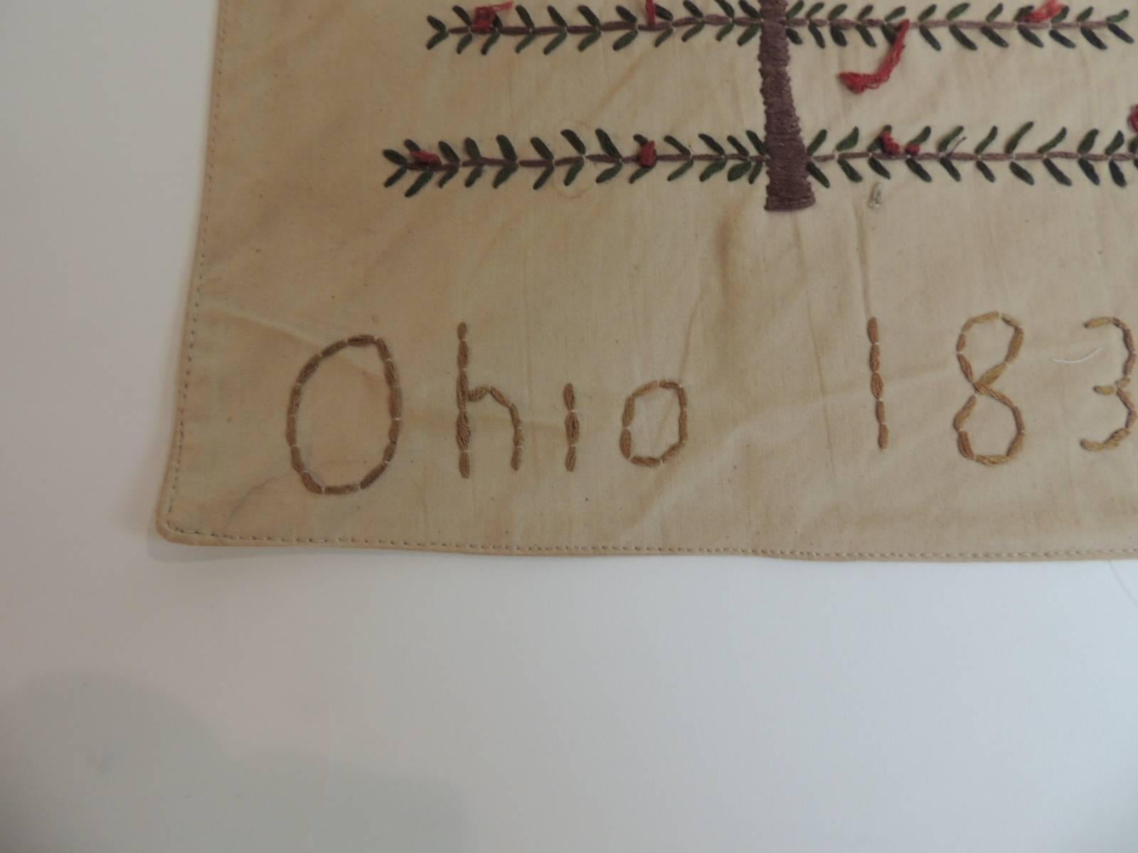 Offered by the Antique Textiles Galleries:
Primitive small Americana embroidered sampler depicting a Christmas tree and signed Ohio, circa 1838. Cotton on cotton embroidery.
Size: 10 x 13.


 