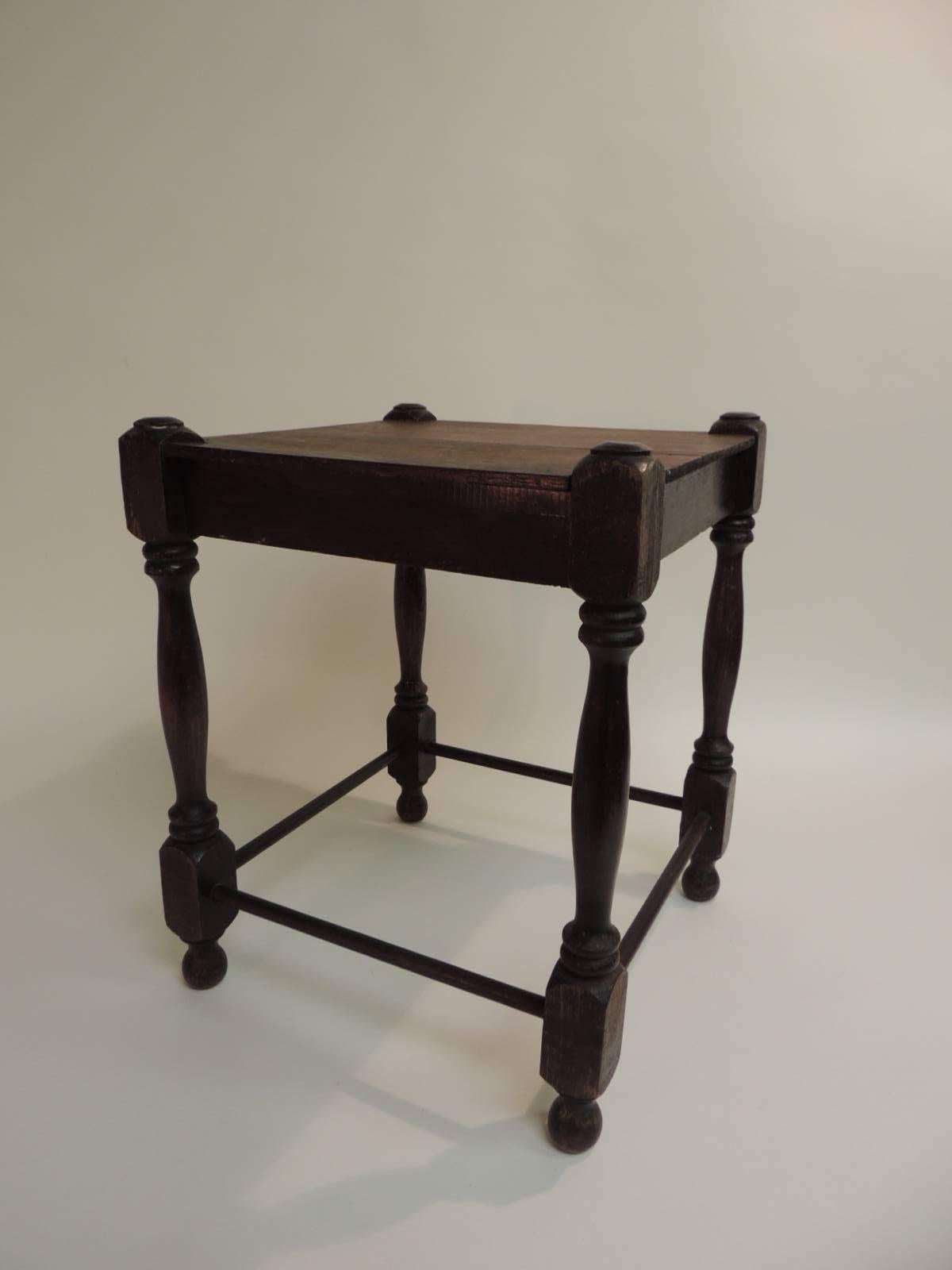 Offered by the Antique Textiles Galleries:

Antique square milking stool with turned wood legs. Rounded stretchers, has a wood top base ready for re-upholstery or a loose fabric cushion.
Size: 12 x 12 x 14.5 H.


 