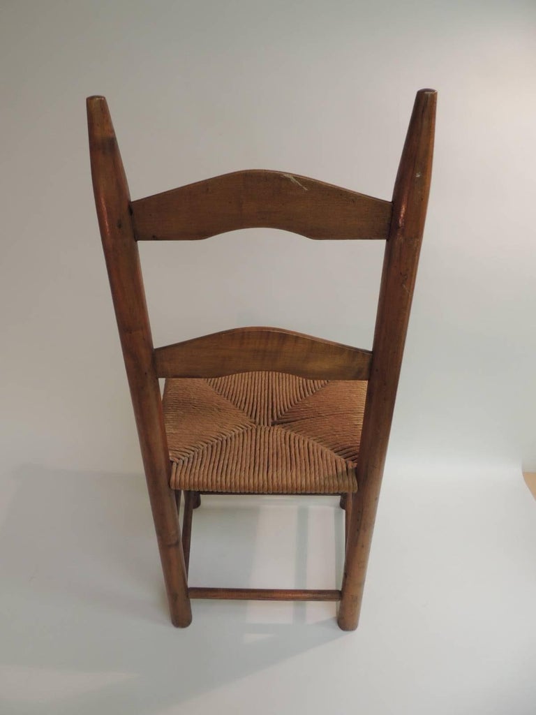 Antique Ladder Back Country Child’s Chair with Rush Seat For Sale at