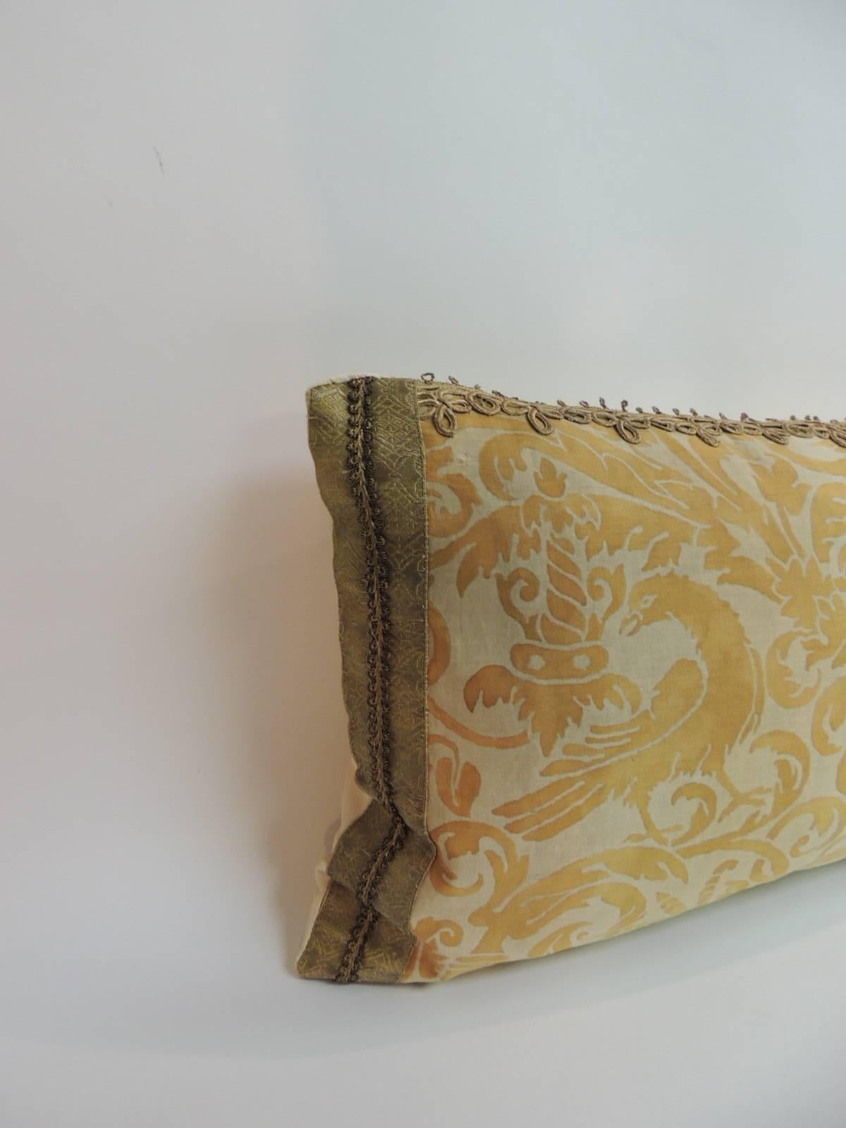 Antique Textiles Galleries:
Fortuny bolster pillow in the Uccelli pattern vintage textile in yellow on white. Embellished with an antique decorative metallic gold threads trim. Decorative pillow finished with a soft yellow backing. Throw vintage