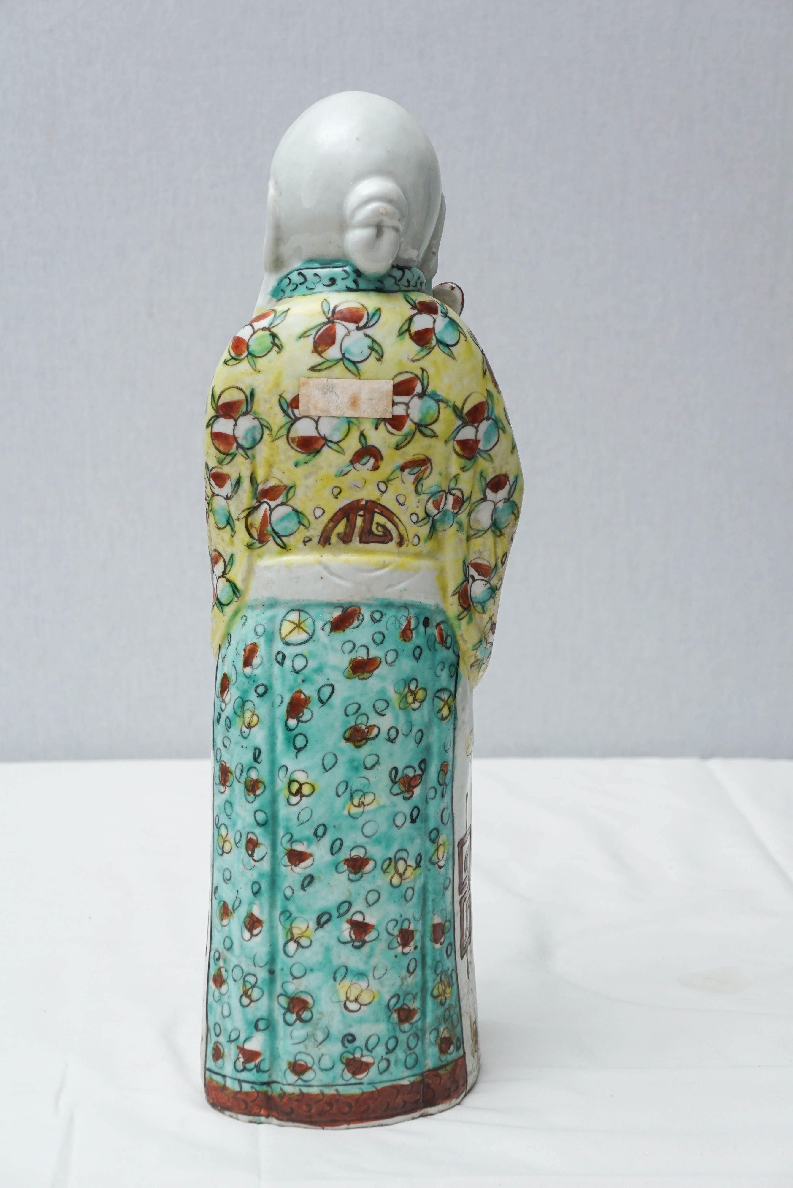 three chinese figures
