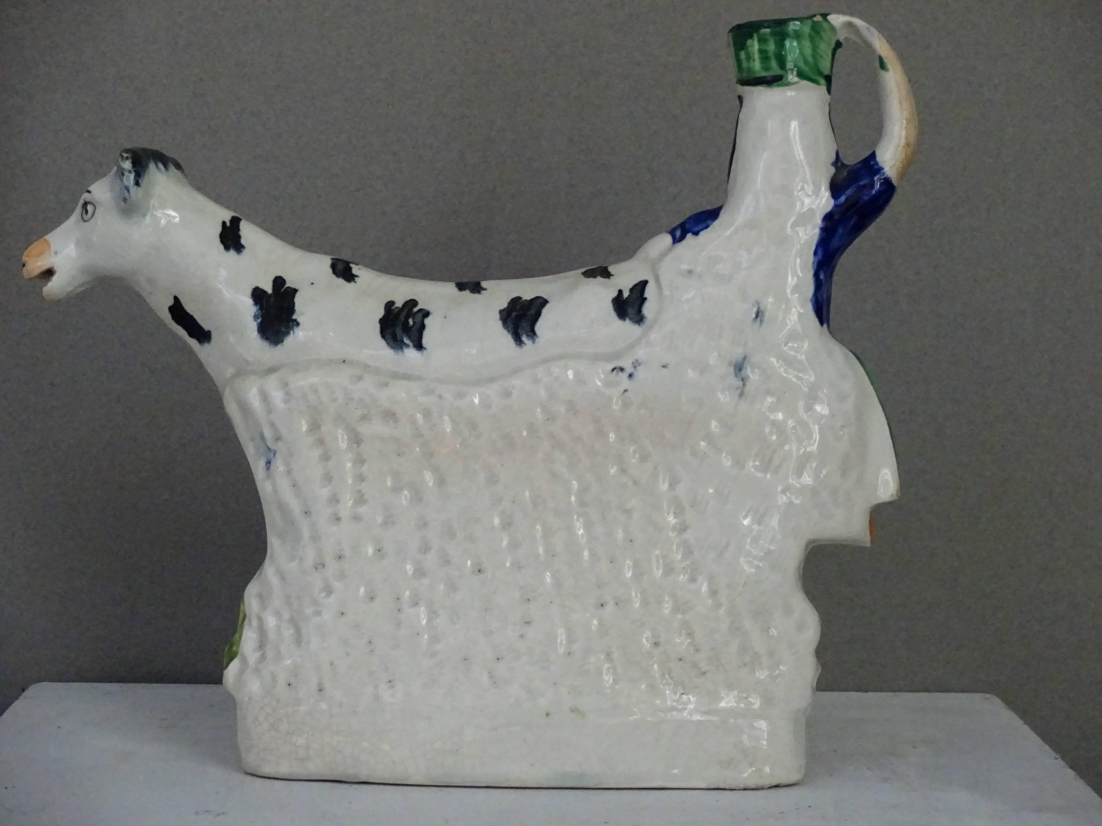 Porcelain Staffordshire Milkmaid with Cow and Calf