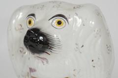 Classic Pair of Similar Staffordshire Porcelain Spaniels