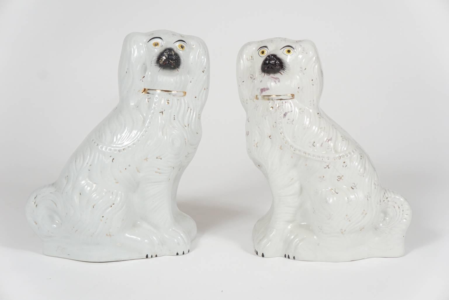 Victorian Classic Pair of Similar Staffordshire Porcelain Spaniels For Sale