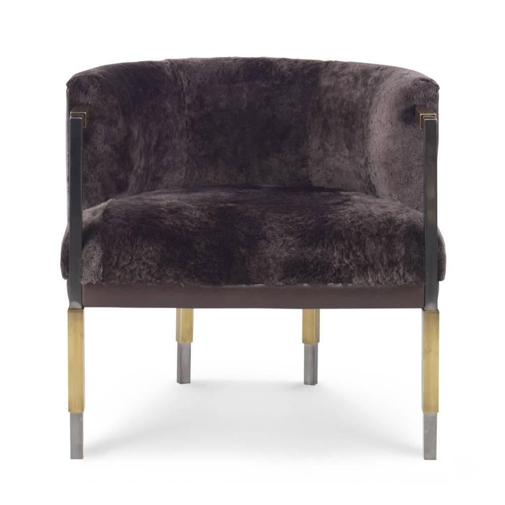 Drawing upon Kelly’s love of mixed metals, the elegant and soulful Larchmont chair features pewter patina legs sheeted in burnished bronze. The softly rounded tight back and seat are upholstered (as shown) in a mix of Mink Shearling (inside) and