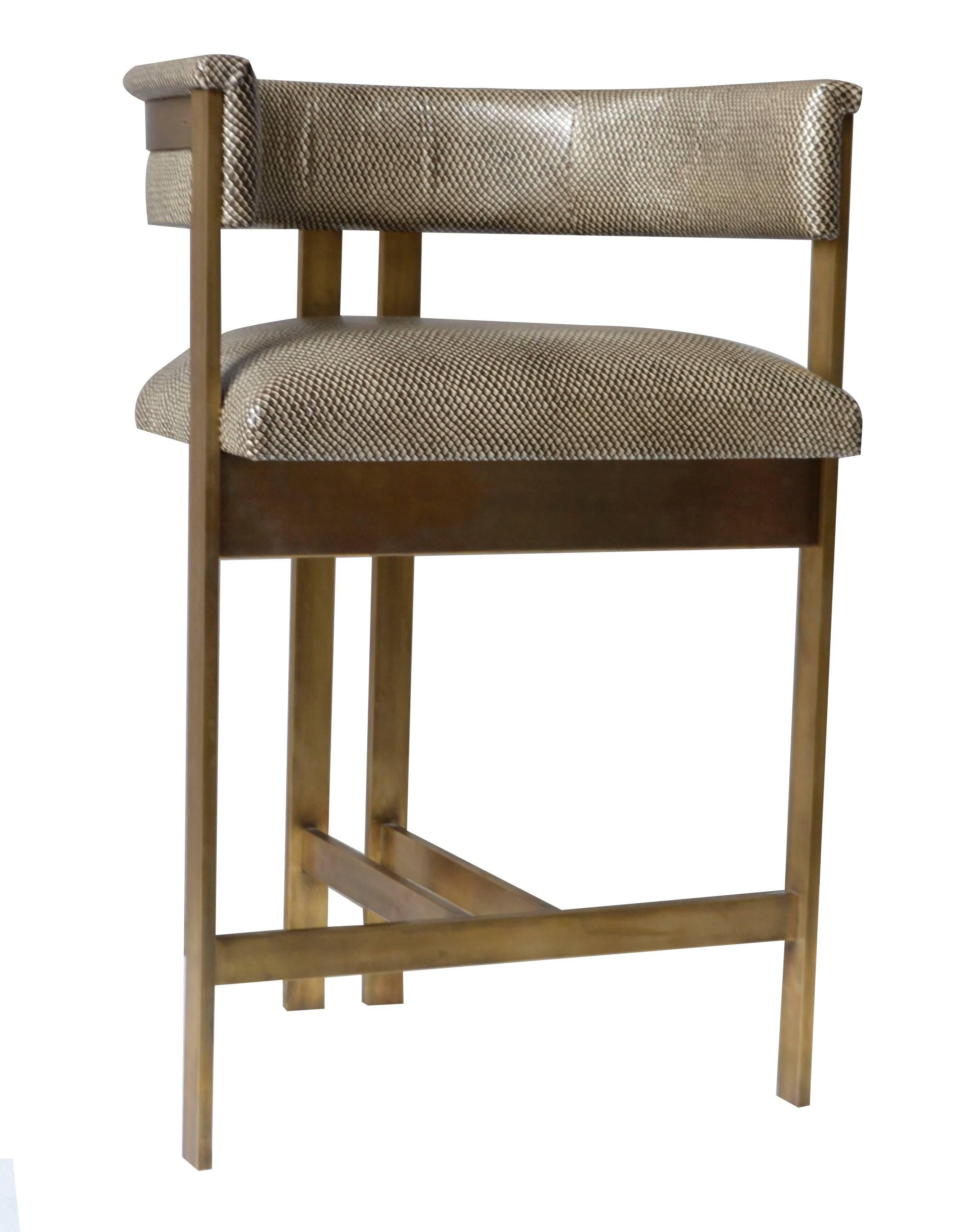 Set of Four Elliott bar stools, 2015. A truly Classic form with modern proportions, the Elliott bar stool is crafted in leather and 1/2” solid bronze stock, giving it substantial weight. This elegant bar stool sits comfortably, with plenty of width