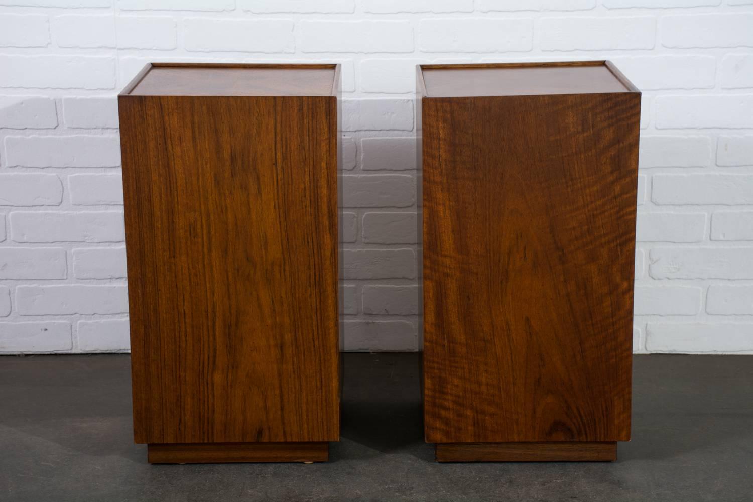 This is a pair of vintage Mid-Century rectangular walnut side tables.