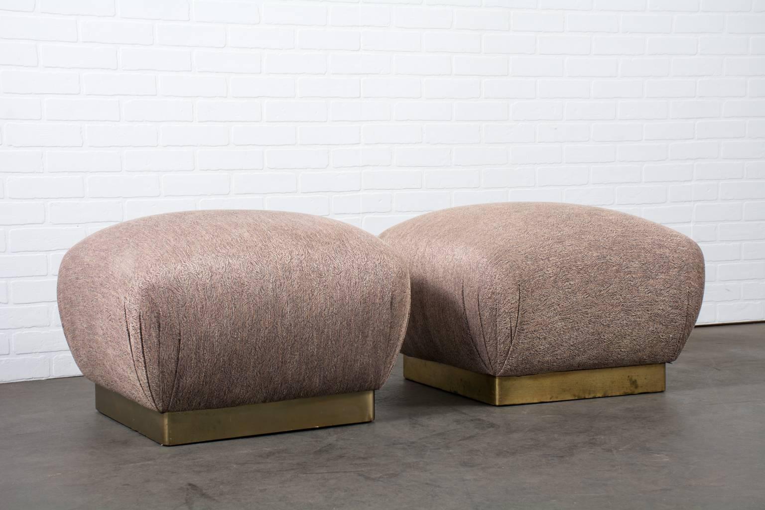 This is a pair of vintage ottomans by Marge Carson with the original upholstery.