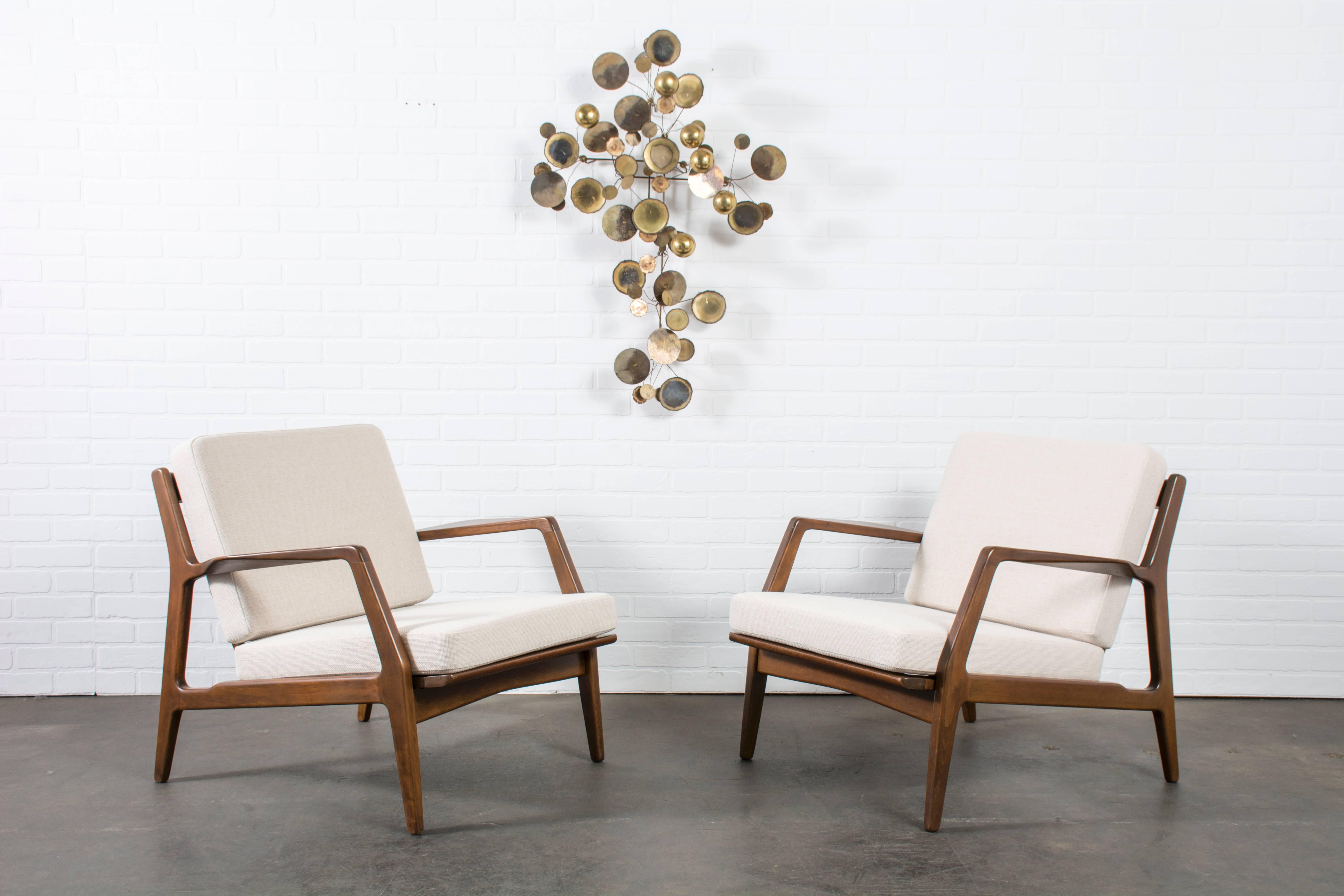 Wood Pair of Danish Modern Lounge Chairs by Ib Kofod Larsen