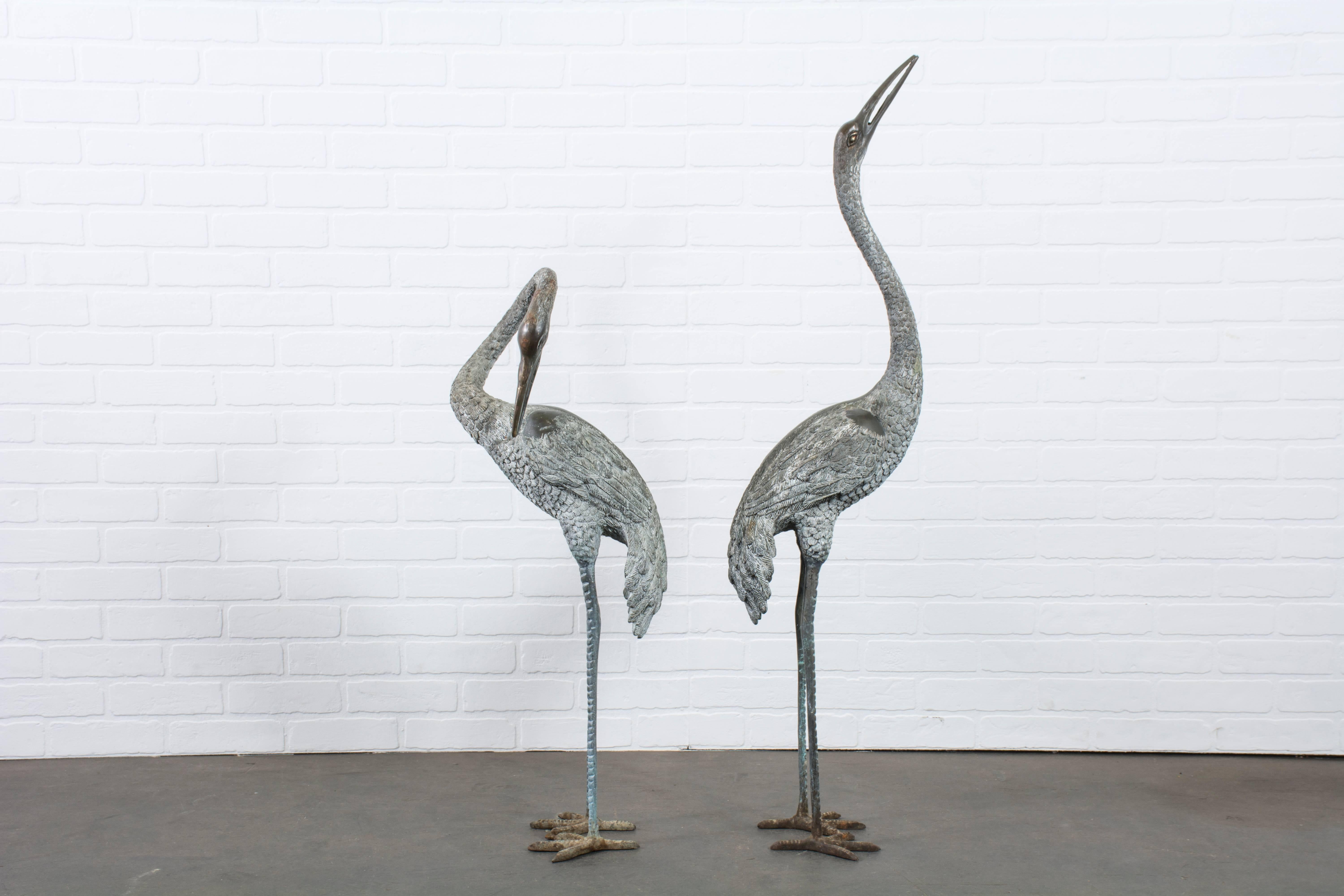 This is a pair of large vintage bronze cranes, circa 1950's.

Measurements:

approximately 46