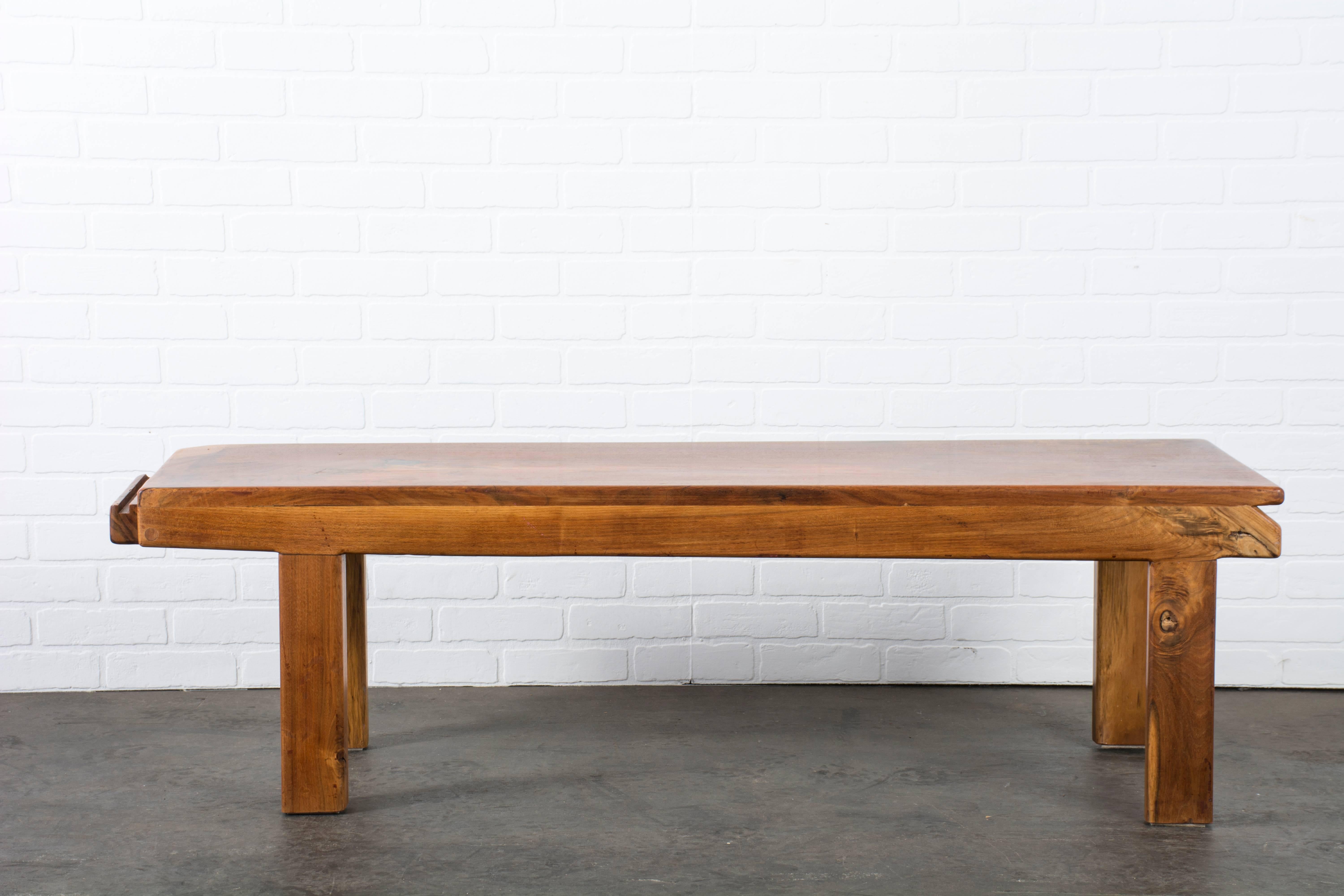 This is a vintage studio craft claro walnut bench, circa 1970s. Measurements: approximately 58.5