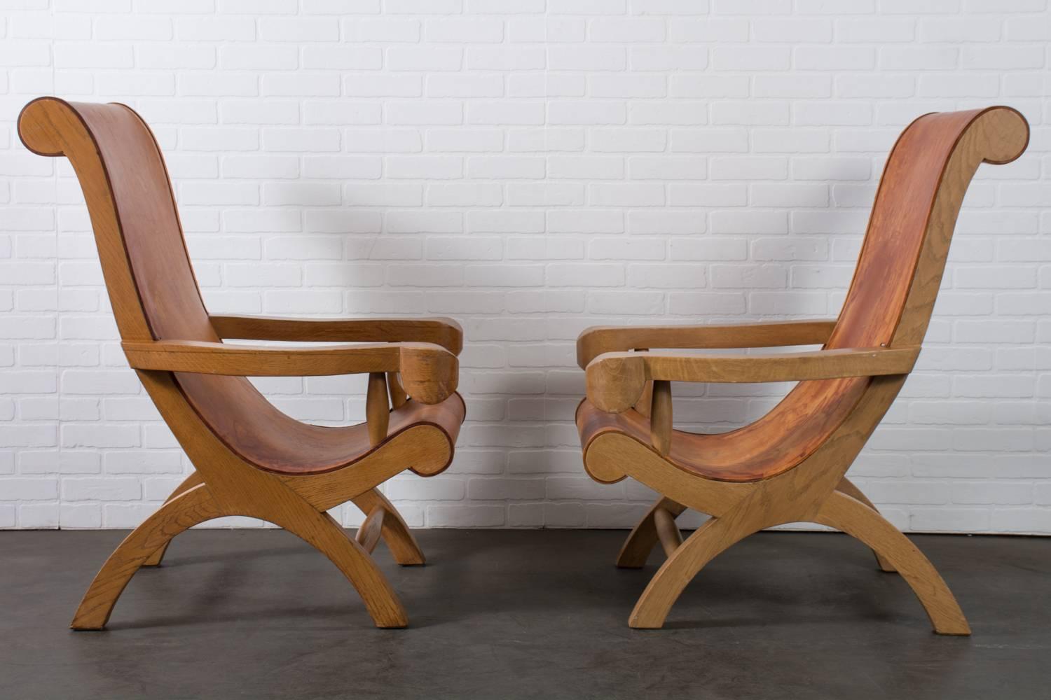 These vintage midcentury butaque (or butaca) chairs are attributed to Cuban designer, Clara Porset, Mexico City, 1940's. Many well-known Mexican architects, such as Luis Barragán, used Clara Porset's version of the butaque chair in their interiors.