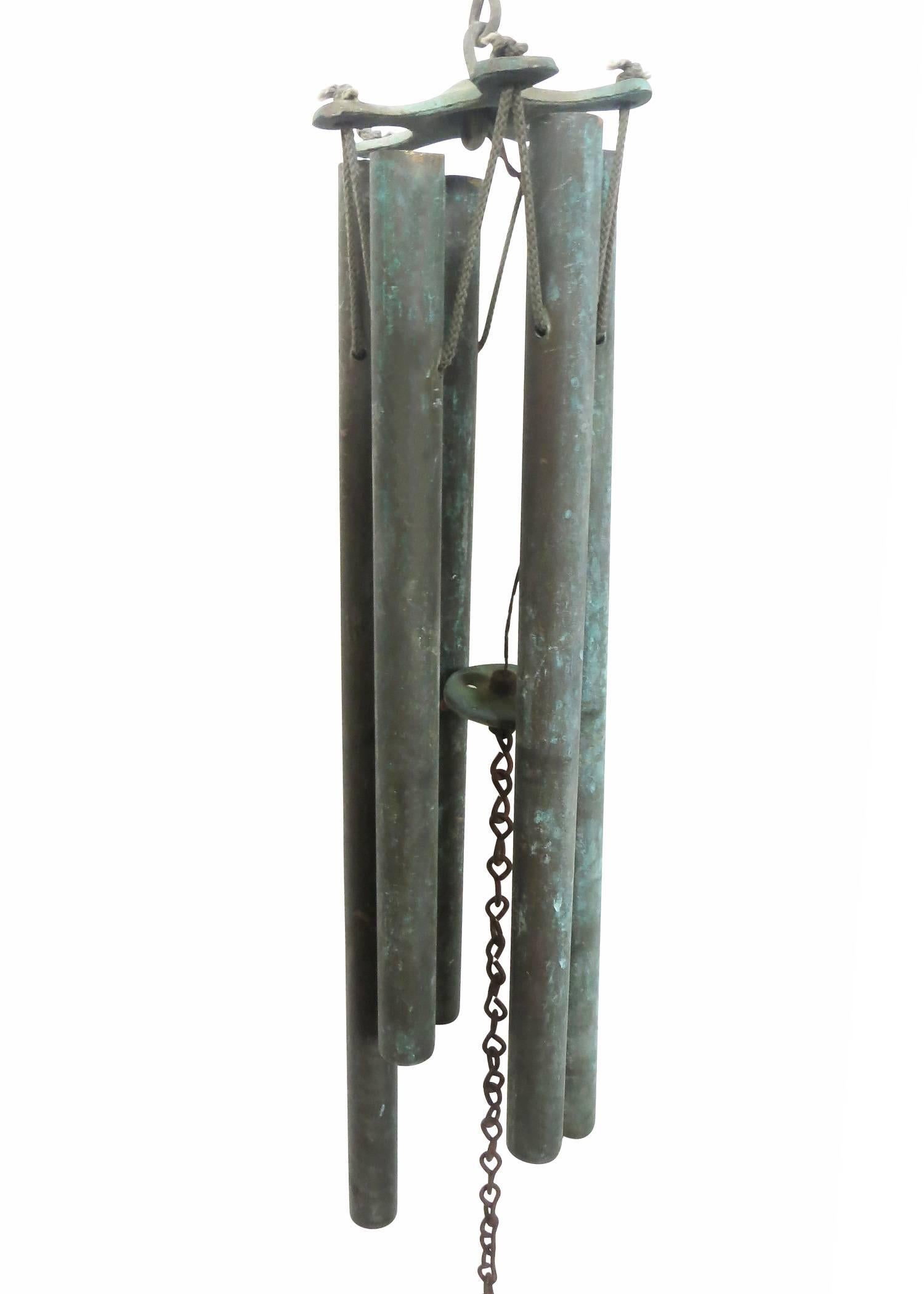 Walter Lamb attributed modernist bronze tubing and sheet bronze wind chimes with a sound similar to church bells. From the beaches of Hawaii Walter Lamb created wonderful furniture and accessories in the 1950s and 1960s. Measures: 26.5
