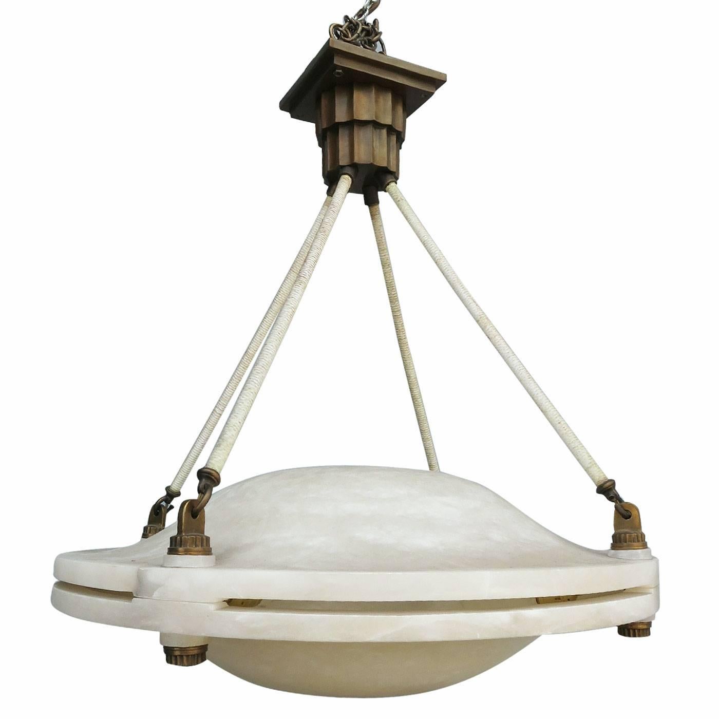 Dear Customer, I have marked many of my items for the 1stdibs Saturday Sale, take a look and save from 20% to 50% now

Art Deco chandelier made of alabaster. The chandelier is comprised of double domes with bronze appliques and ceiling cap. Cord