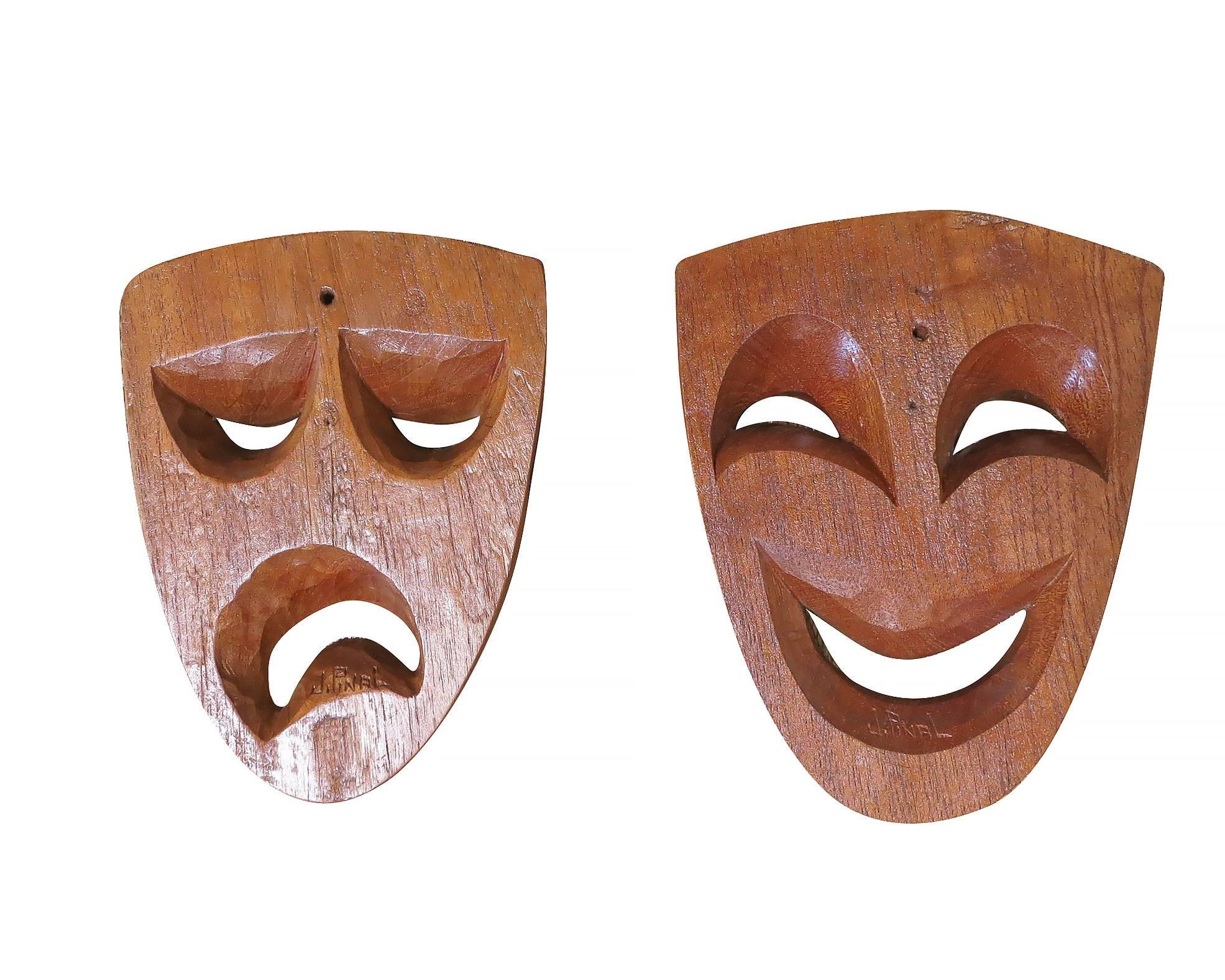 Hand-carved Tragedy and Comedy drama theatre mask set by Mexican artist Jose Pinal. 

Signed 