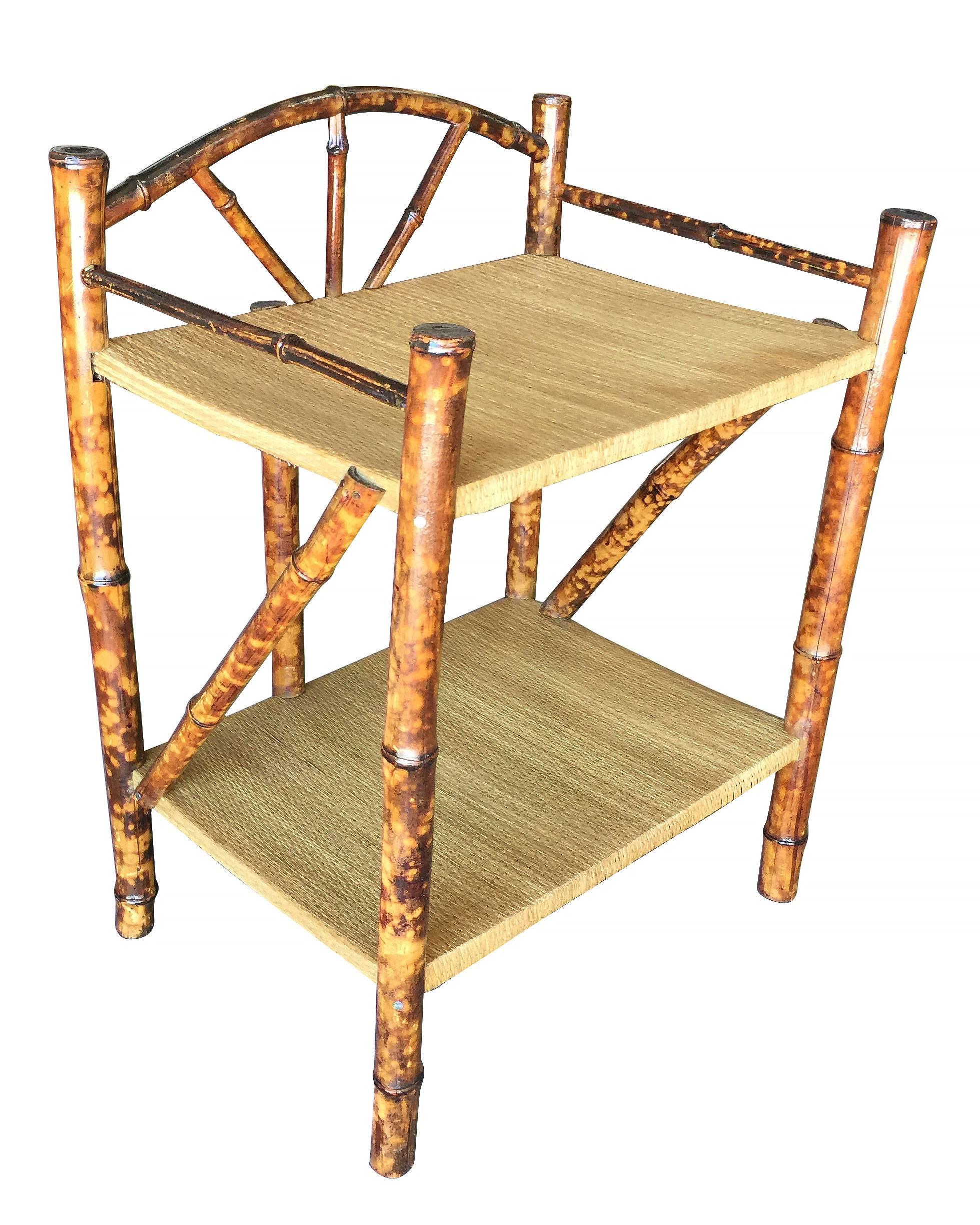 Antique tiger bamboo two-tier short shelf with rice mat top.


Restored to new for you.

All rattan, bamboo and wicker furniture has been painstakingly refurbished to the highest standards with the best materials. All refinishing is done by rattan