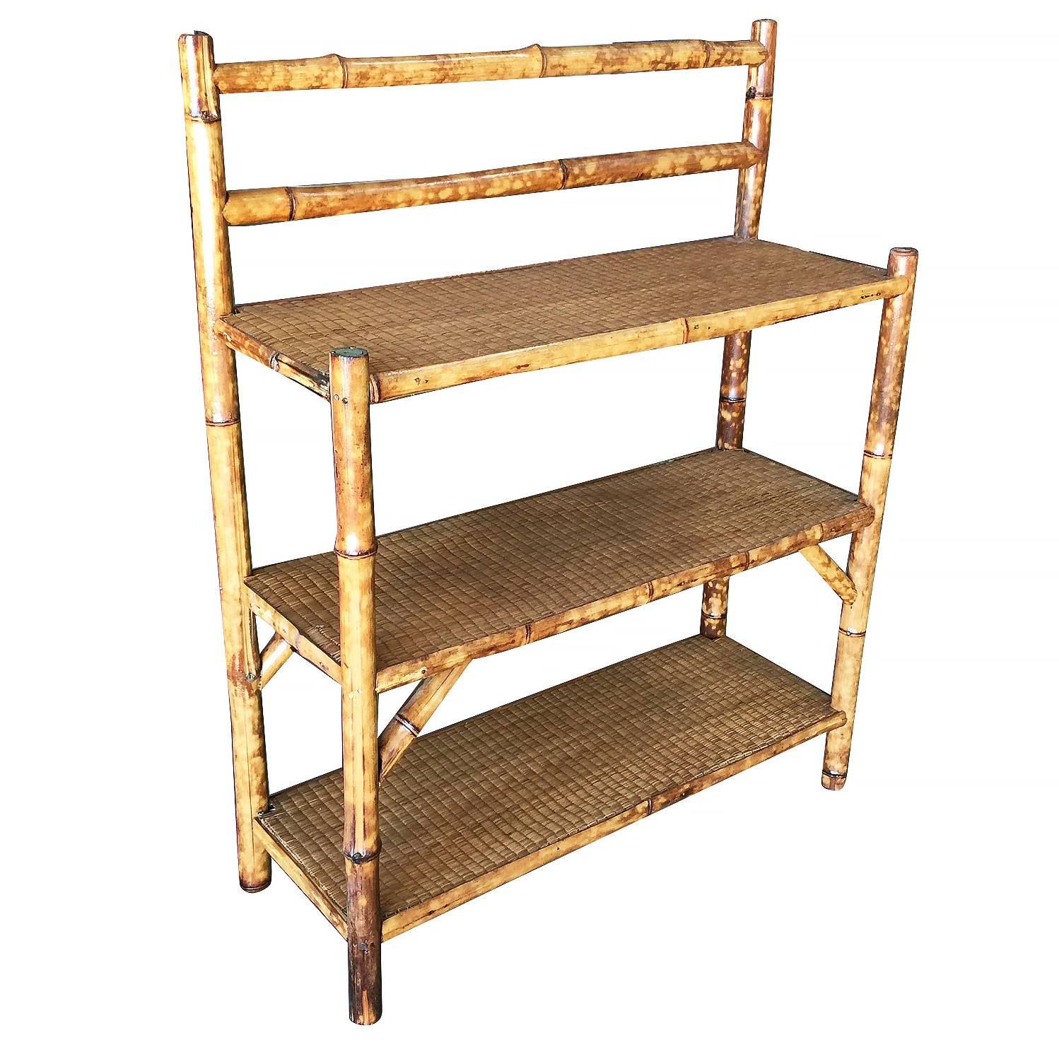 Antique three-tier tiger bamboo shelve or rack with rice mat top.


Restored to new for you.

All rattan, bamboo and wicker furniture has been painstakingly refurbished to the highest standards with the best materials. All refinishing is done by