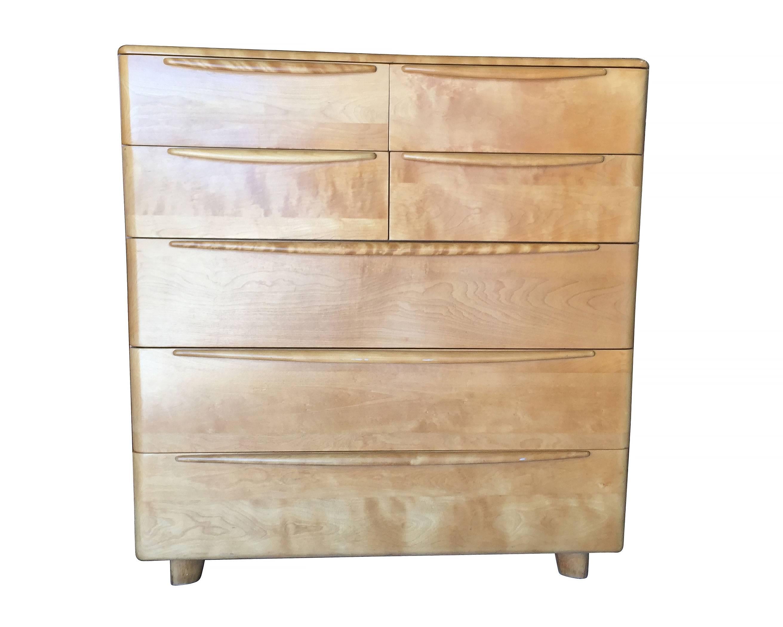 Blonde maple highboy dresser featuring the 