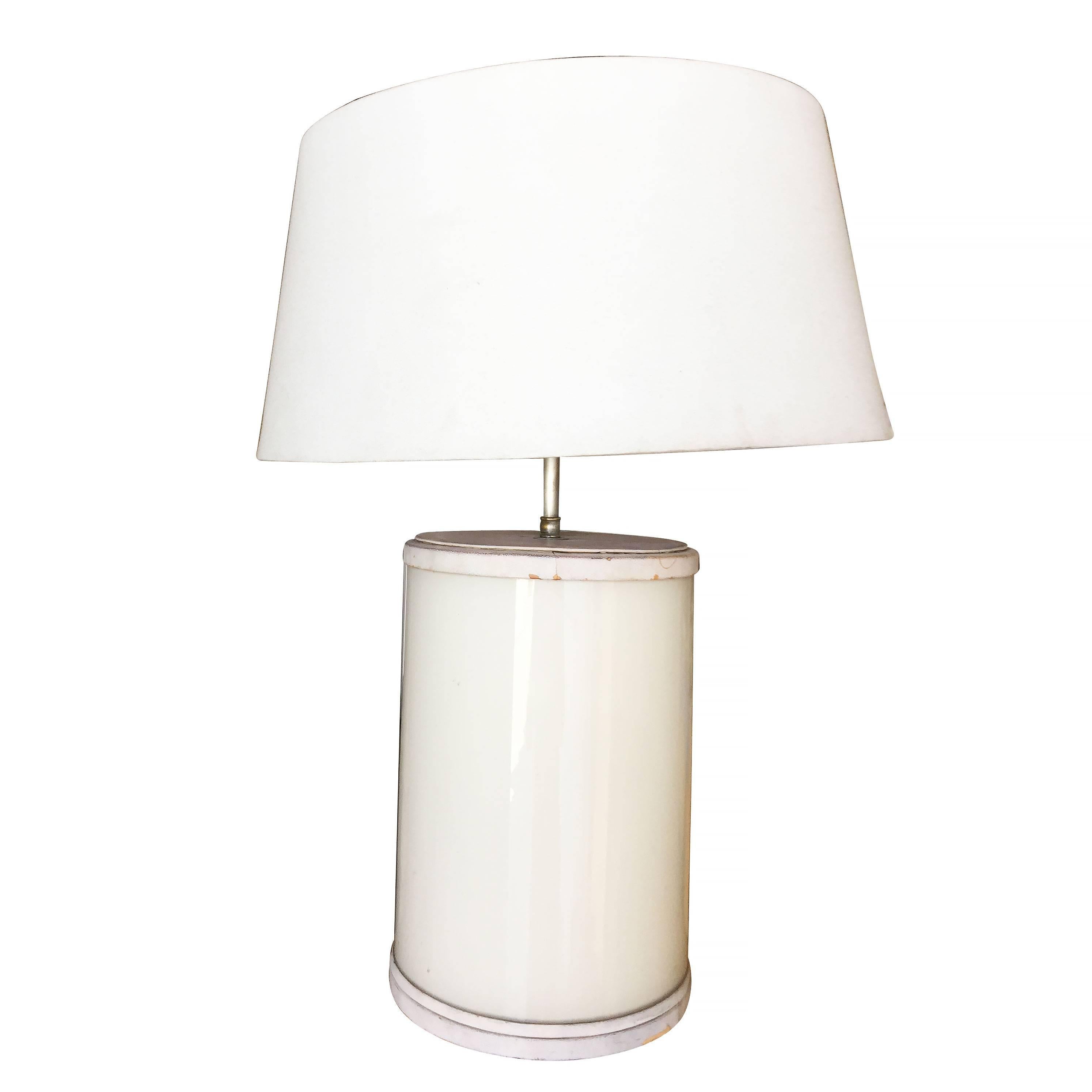 Paul Frankl custom white glass lamp with top and bottom pressed leather cap. 

Lamp- 26