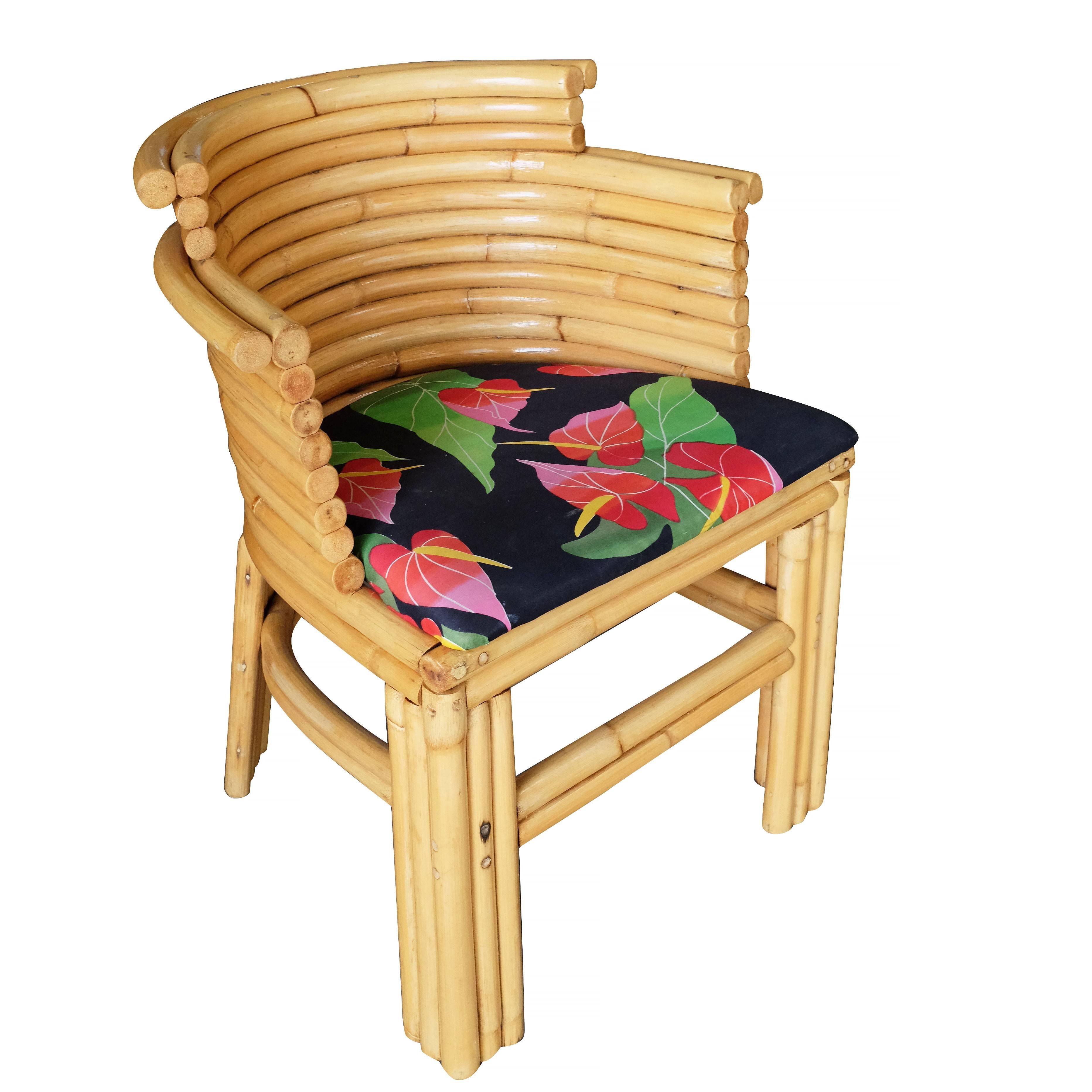 Set of four Paul Frankl streamline rattan dining room chair each chair featuring a stacked streamline back and 5 strand pole strand legs. 

Cushions made to order included. The cushions pictured are good vintage shape but can be replaced upon
