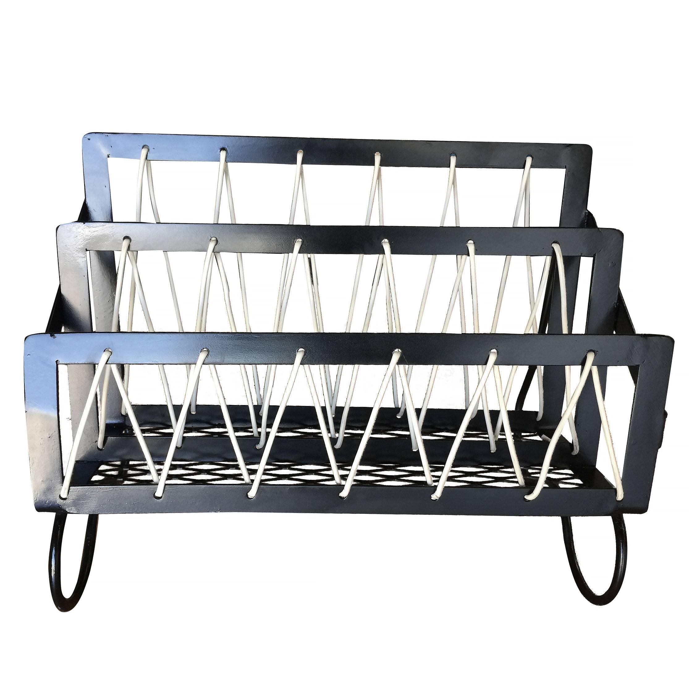 Walter Lamb mid-century style magazine stand with iron base and zig zag cotton rope accent.