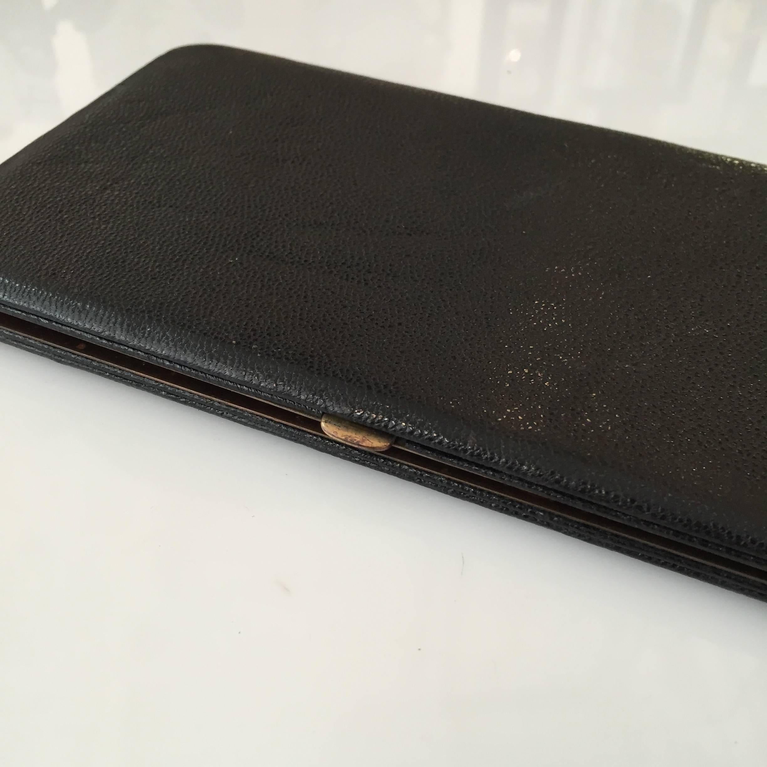 Leather Dunhill Cigarette case in a pocket book style.

4