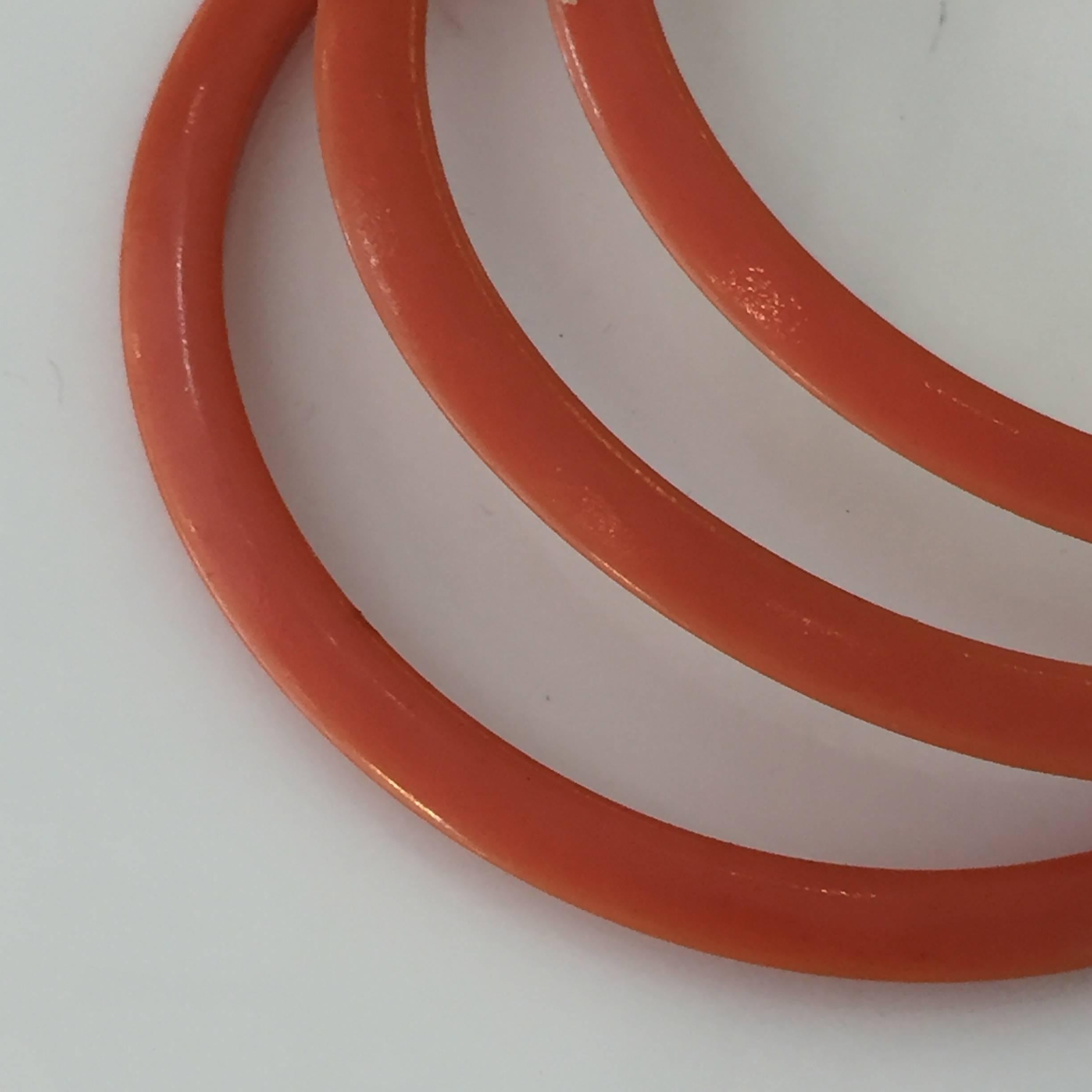 Lot of Three Tangerine Celluloid Bakelite Bangles Bracelets In Excellent Condition In Van Nuys, CA