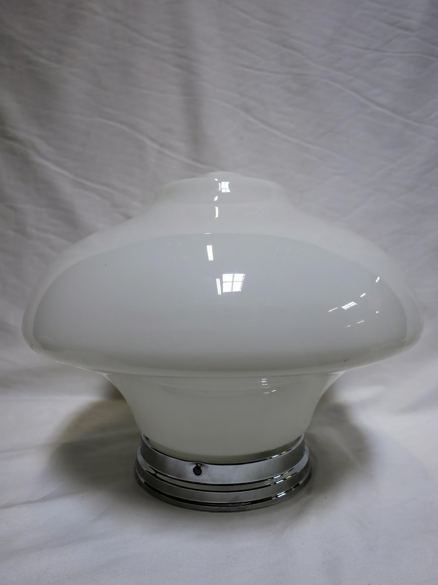 Once used everywhere from classrooms, libraries and courthouses alike, schoolhouse globes offered a practical and utilitarian design with solid, hard-working ambient lighting. Our globe features a large, bell-shape in Classic white milk glass that