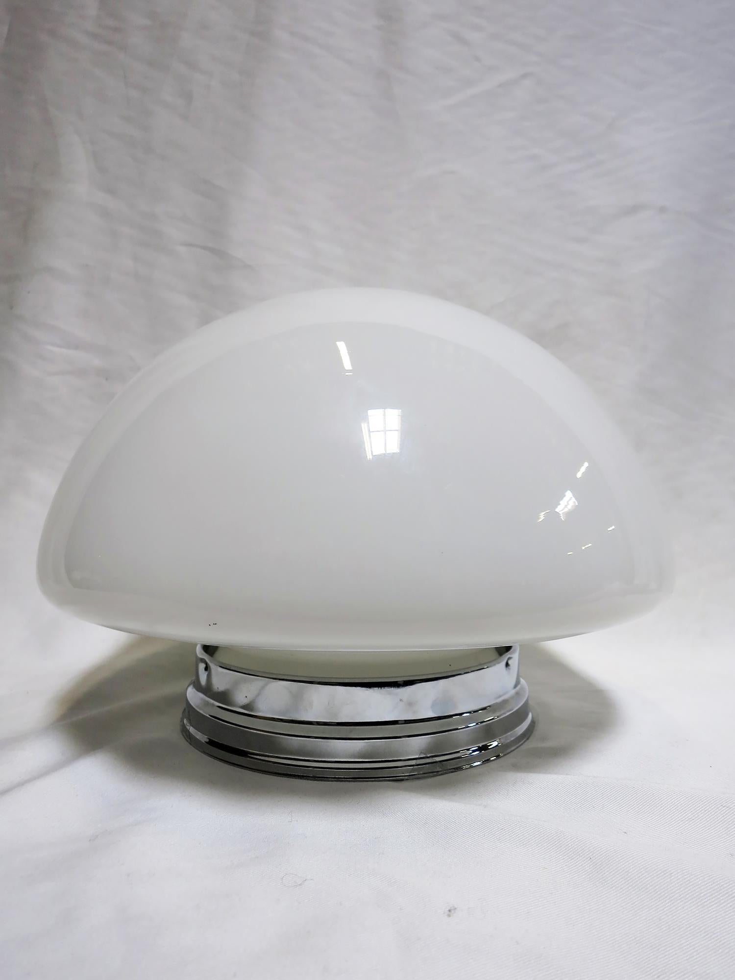 Once used everywhere from classrooms, libraries and courthouses alike, schoolhouse globes offered a practical and utilitarian design with solid, hard-working ambient lighting. Our globe features a rounded mushroom-shape in Classic white milk glass