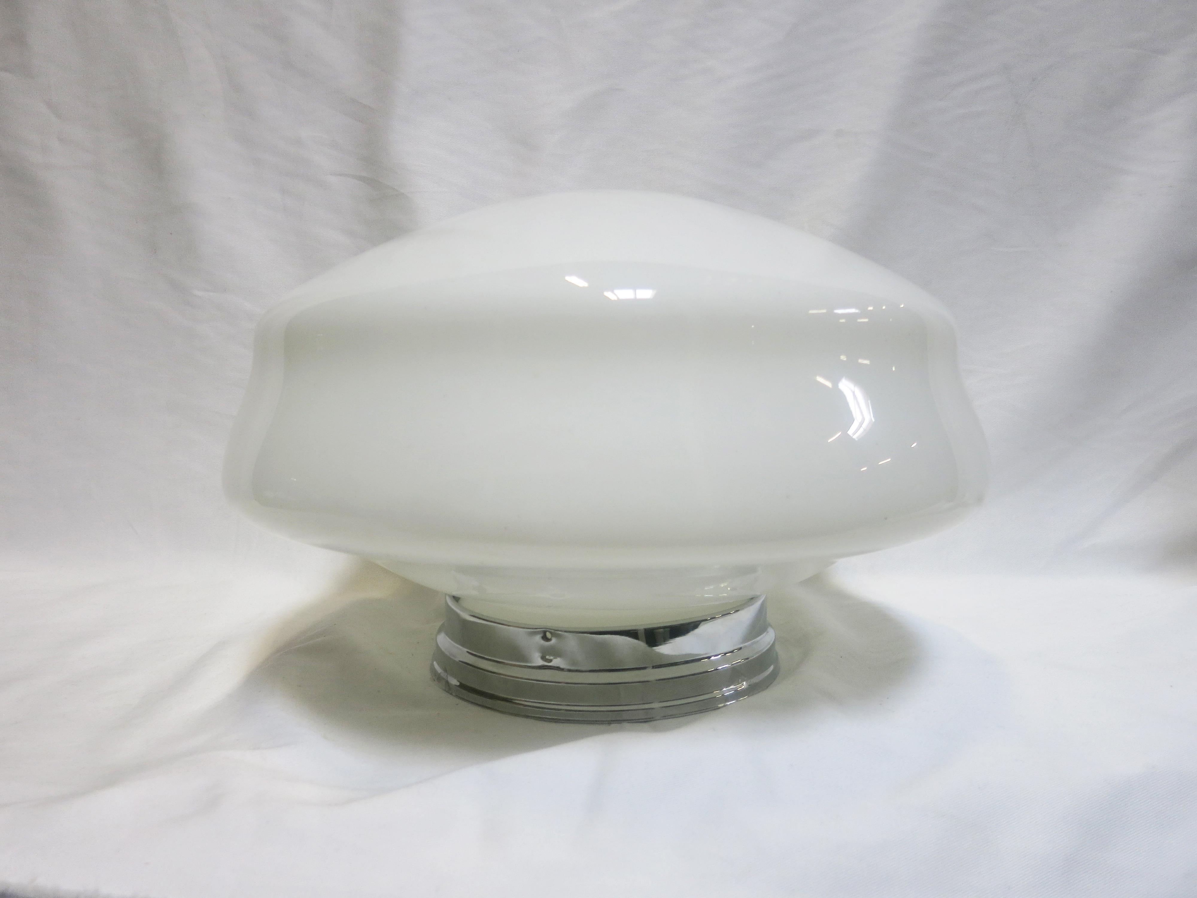 Once used everywhere from classrooms, libraries and courthouses alike, schoolhouse globes offered a practical and utilitarian design with solid, hard-working ambient lighting. Our globe features an oval dome shape in Classic white milk glass that