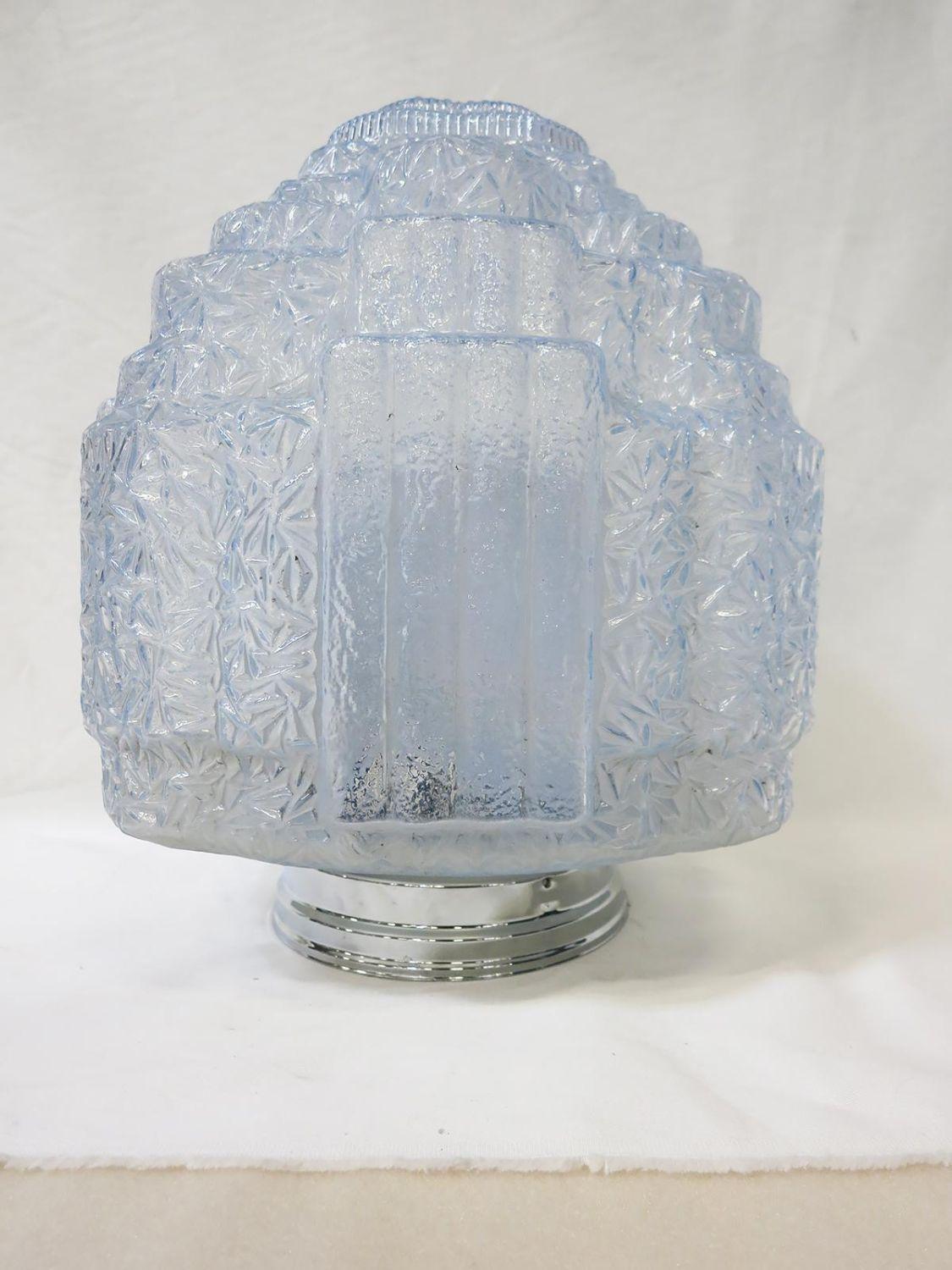 Stunning 1930's Art Deco stepped skyscraper ceiling glass globe in opalescent ice blue glass features alternating ribbed and 