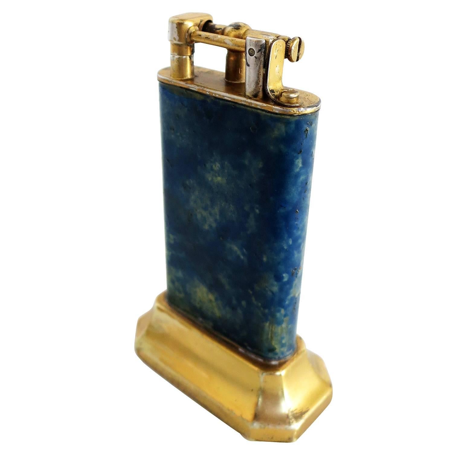 Brass lift arm table lighter with enamel surfac by Dunhill 