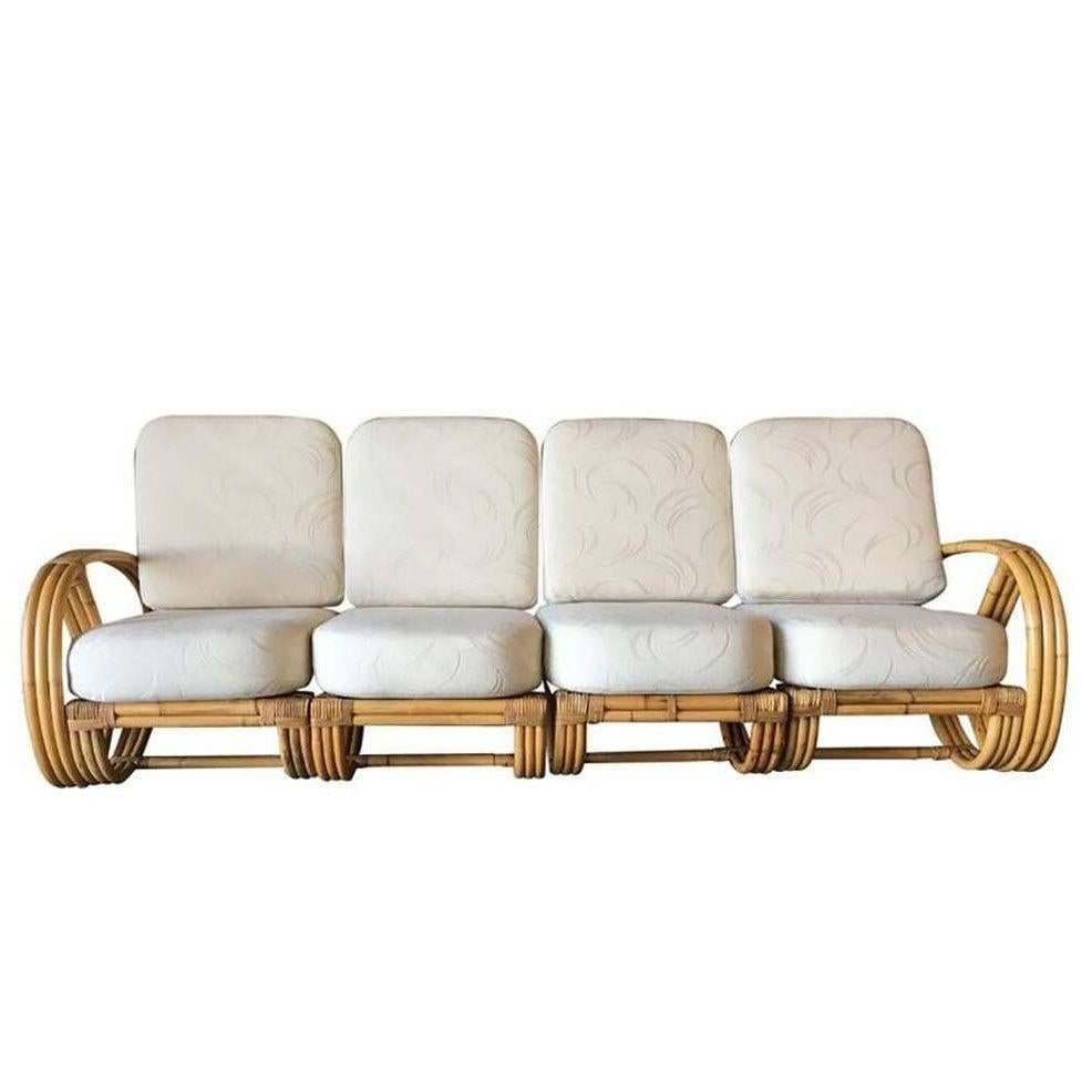 Restored original Modernist 3 strand 3/4 Round Pretzel 4 Seat Sectional Sofa with an open and partially relaxed reclined seat back.

1950, United States

We only purchase and sell only the best and finest rattan furniture made by the best and most
