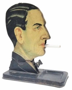 Dick Tracy "Mans Head" Mechanical Tin Cigarette Dispenser by Kellerman 1933