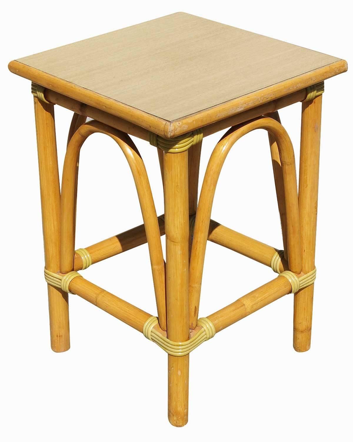 Simply yet elegant small rattan side table with steam pressed arched sides and blond wood grain top. The table features Classic wicker wrappings and Mid-Century appeal,

circa 1950.

Designed in the manner of Paul Frankl.


Restored to new for