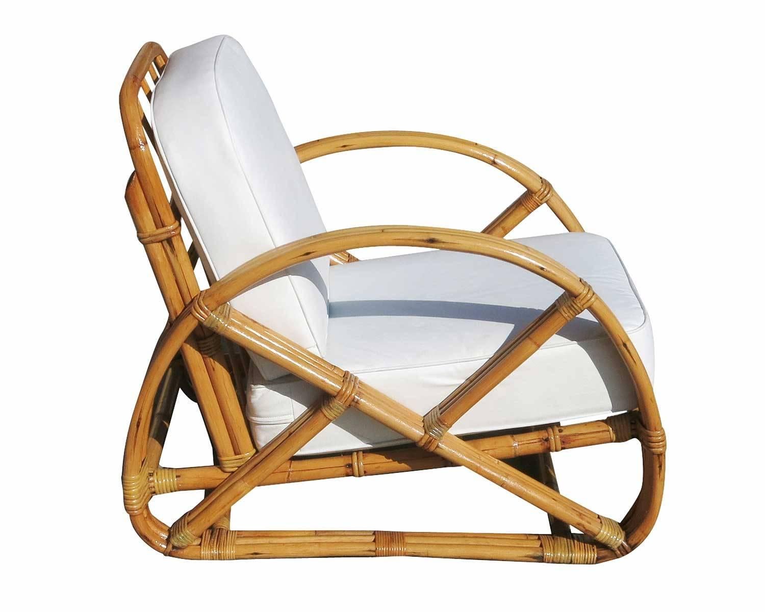 Original 1940s three strand Frankl round pretzel arm lounge chair pair. This chair sets features steam formed stick rattan accents and wicker wrapped joints.

Restored to new for you.

All rattan, bamboo and wicker furniture has been painstakingly