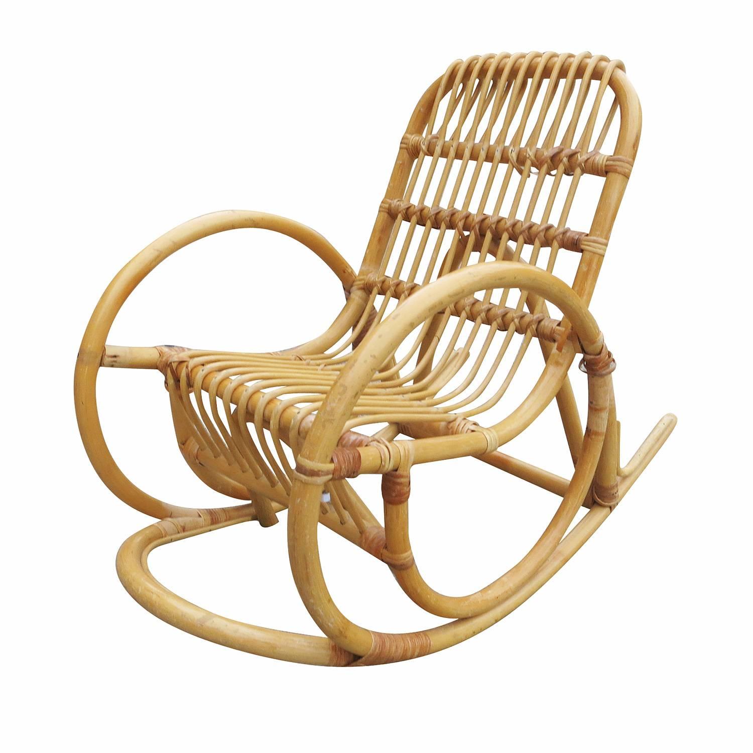 A rare Paul Frankl inspired one-strand snake arm childrens size rattan rocking chair with stick rattan seat. 

Professionally restored to original specifications.

All rattan, bamboo and wicker furniture has been painstakingly refurbished to the