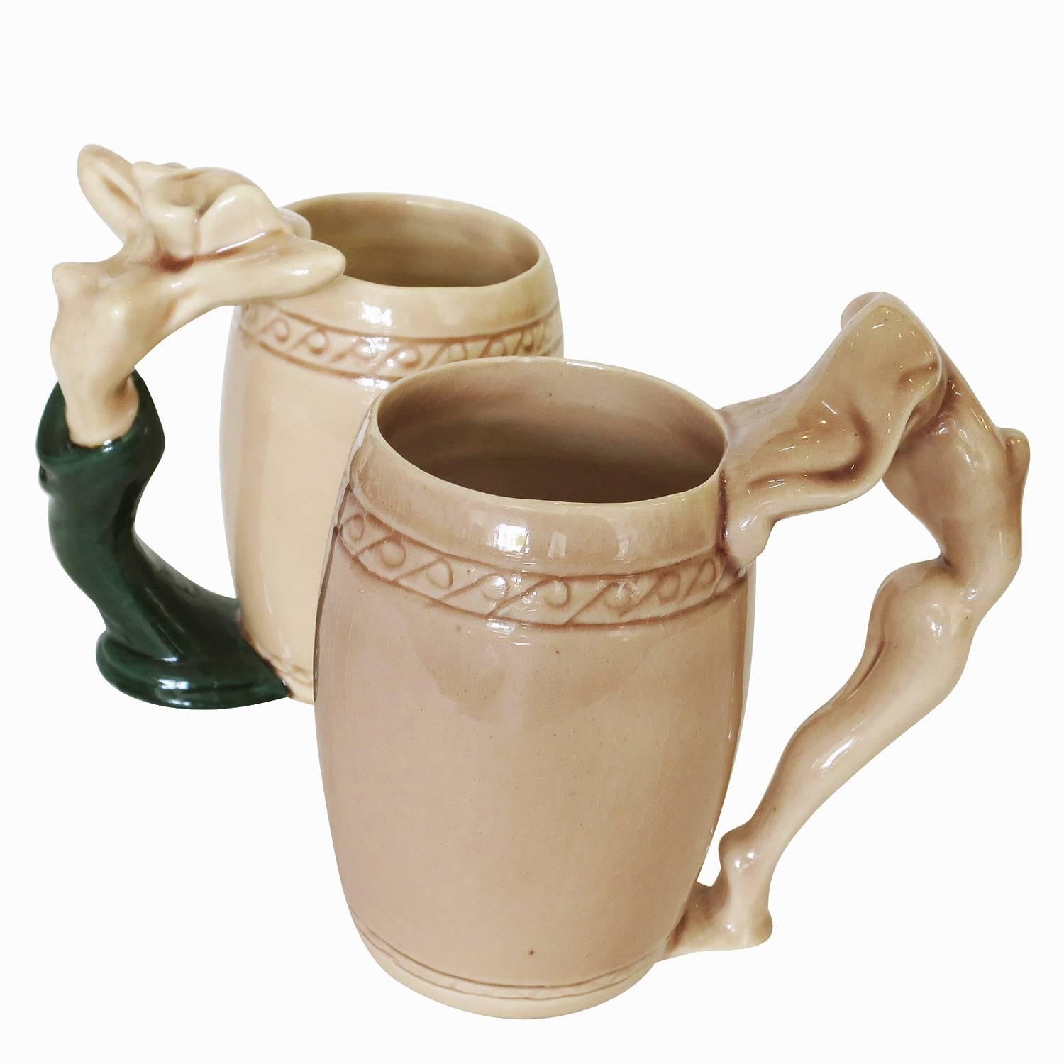 Ceramic female nude mug pair made by the Laguna Beach, California pottery artist Dorothy Kindell known as the 