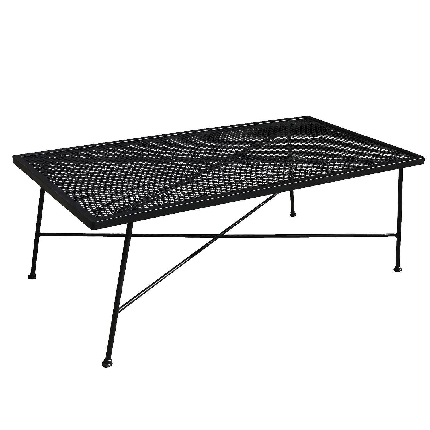 Vintage Outdoor/Patio patio coffee table with iron base and steel mesh top by the Woodward company. Table has been repainted in black but can be repainted in your choice of color.

circa 1950, USA by Woodard.