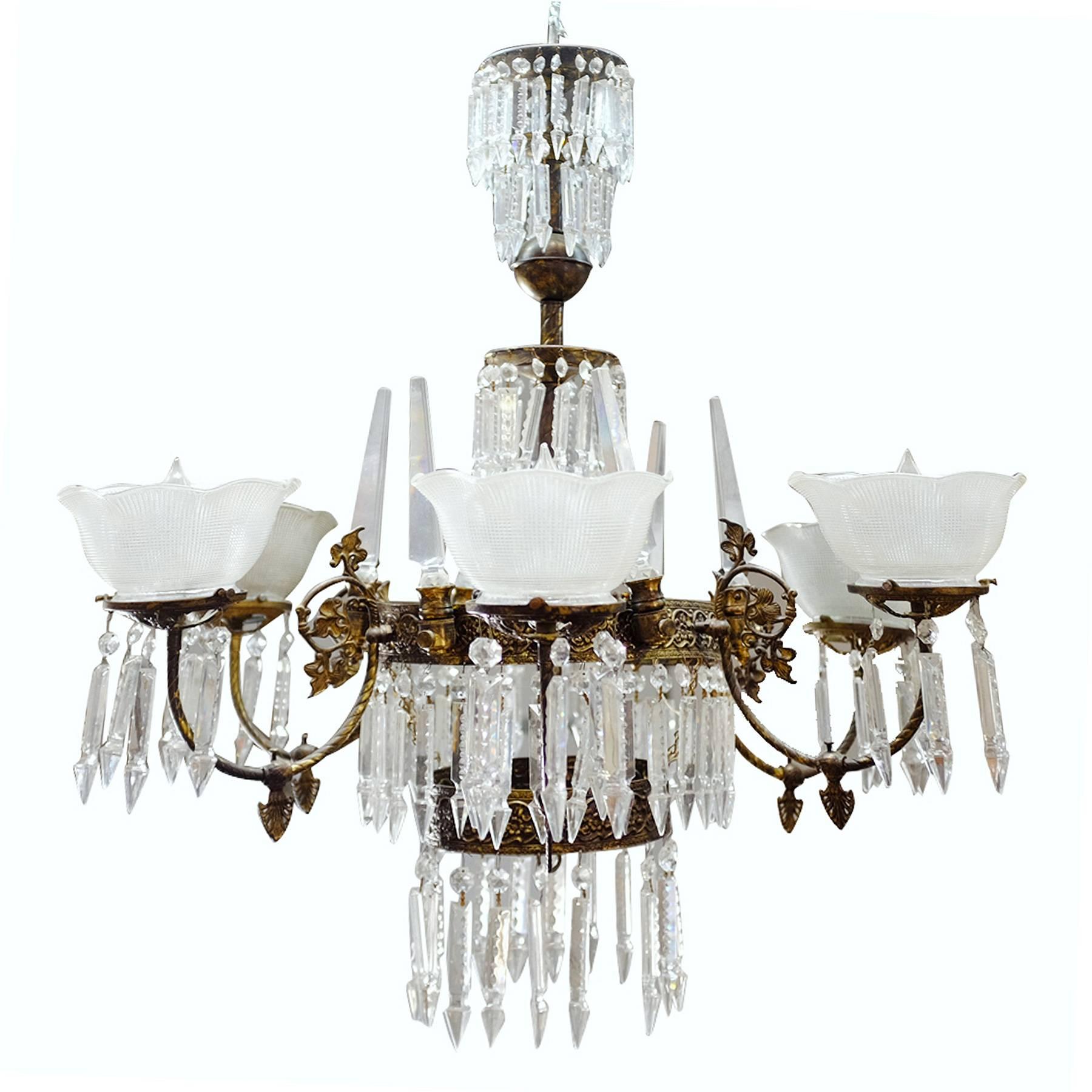 Romanesque style Six-light electric chandelier featuring a mix of hang crystal and handkerchief shade shades, circa 1980.

Available Five.