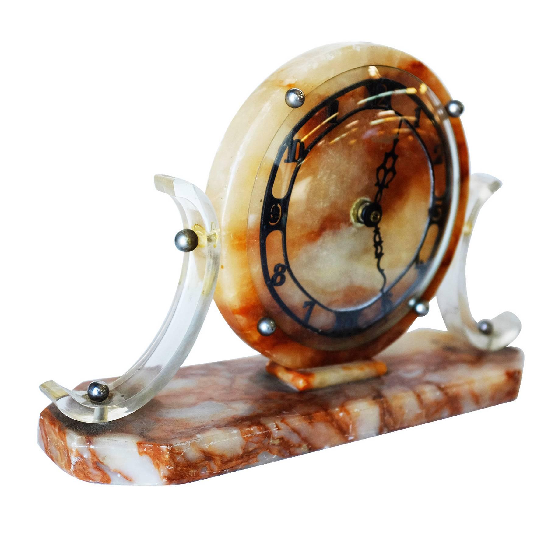 High style marble modernist mantel clock with unique acrylic accents and new quartz movement, circa 1950.