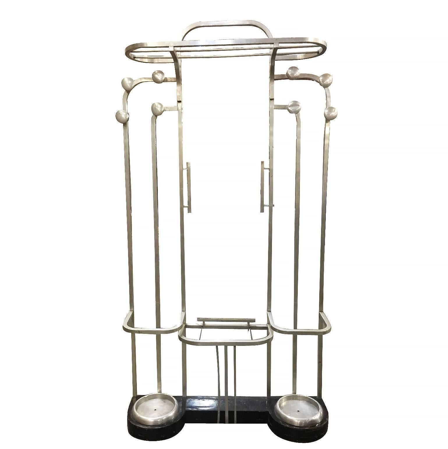 Large streamline French Art Deco hall tree, circa 1930. Constructed of square aluminum tubing, this stand has 