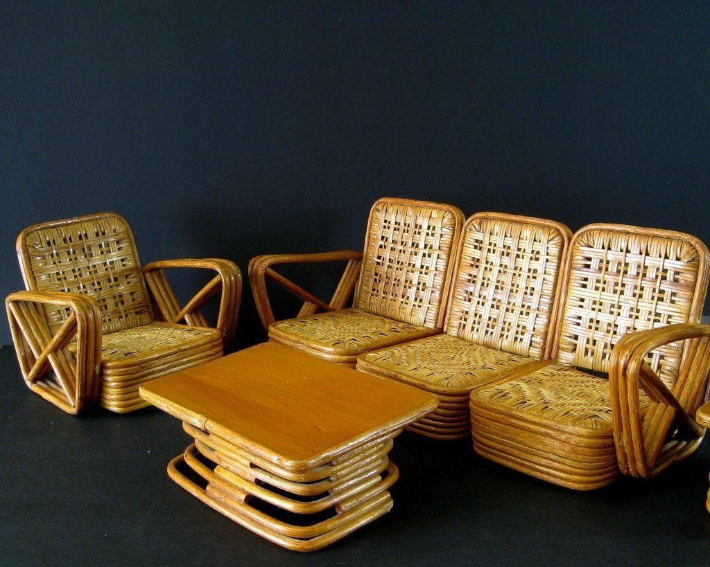 Paul Frankl salesman sample rattan furniture circa 1950 vintage miniature Florida room chair sofa table

This is terrific! It's a salesmen sample Paul Frankl style miniature Florida room suite. It's constructed just like a full-size set would be.